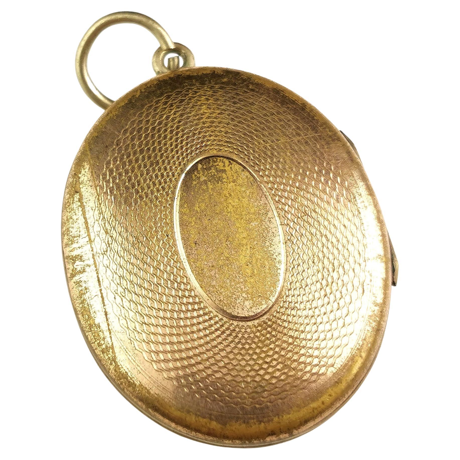 Antique Victorian gilt locket pendant 