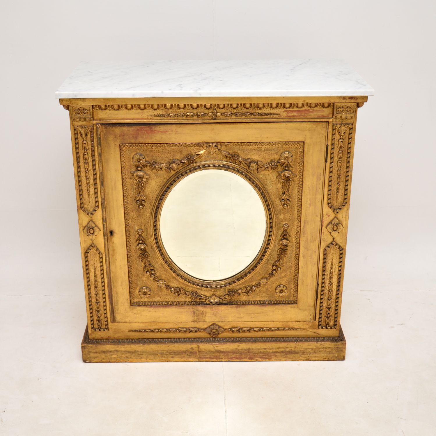 A beautiful and quite unusual antique Victorian gilt wood marble top cabinet. This was made in England, it dates from around the 1860-1880 period.

It is of fantastic quality, this is full of character and charm with stunning details throughout. The