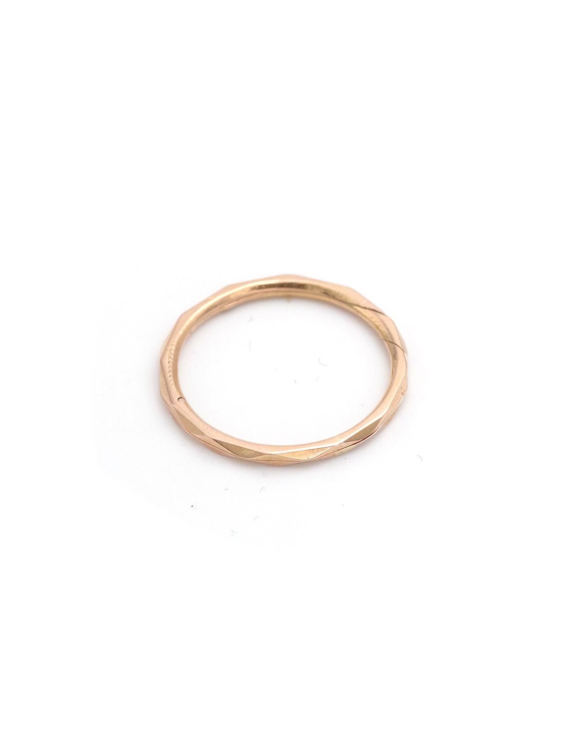 Antique victorian Gimmel wedding band in 18 karat gold. Double wedding band with fully faceted edges, it opens and allows the engraving of a date or a hidden message inside. It is secured by interlocking the rings. This is an antique wedding band.