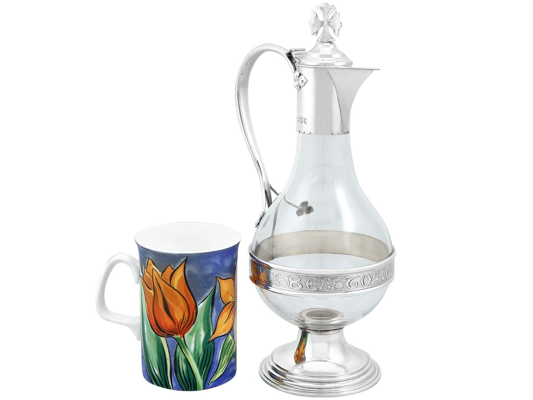 An exceptional, fine and impressive antique Victorian glass and English sterling silver mounted communion wine jug; an addition to our wine and drink related silverware collection

This exceptional antique Victorian sterling silver and glass wine