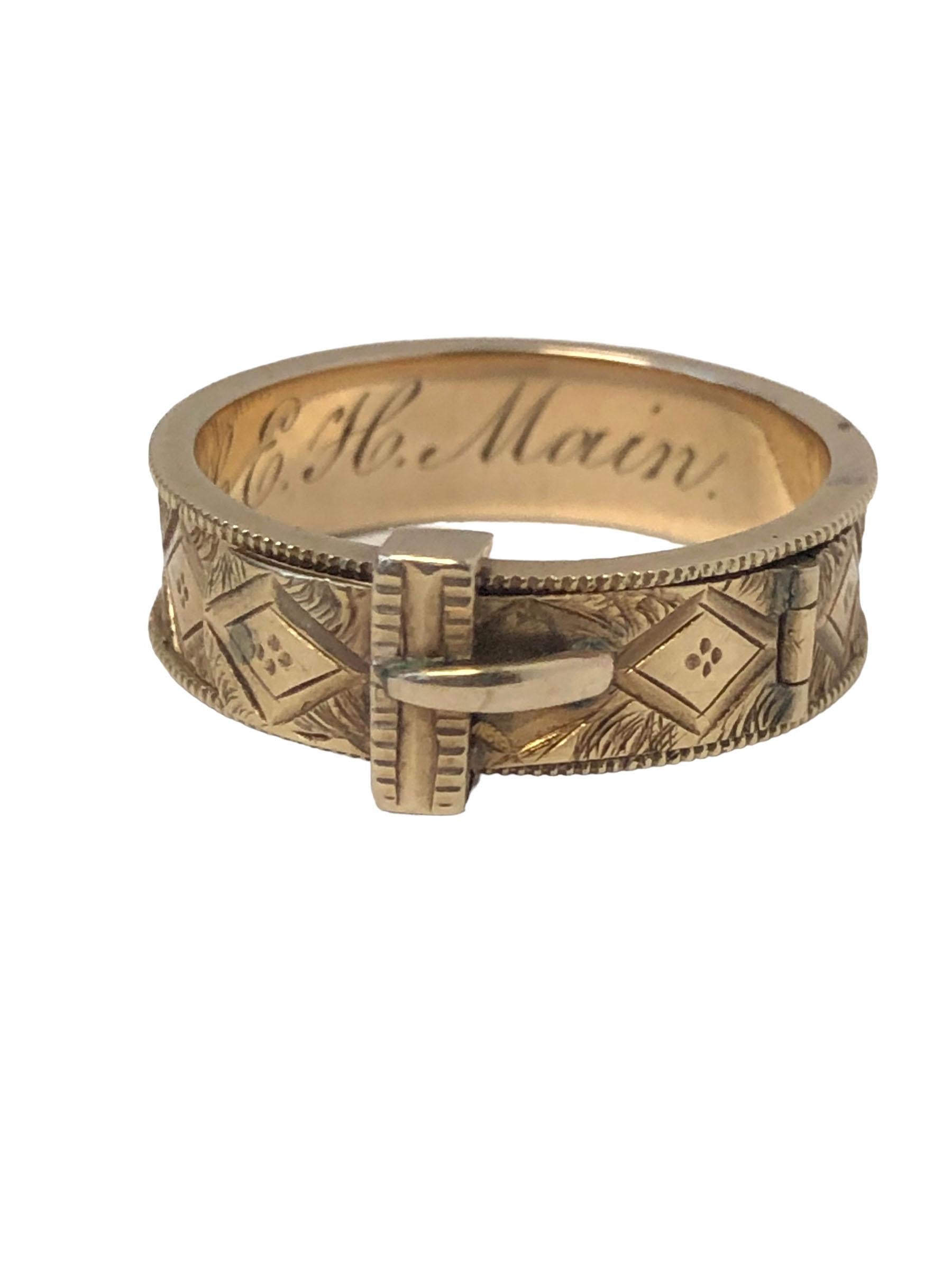 Circa 1850 - 1870 14k Yellow Gold Buckle Form Mourning Ring, measuring 1/4 inch wide and is a 6 3/4 finger size, incredible near mint condition considering the age with hand engraving / chasing workmanship, the Buckle on the top is hinged and when