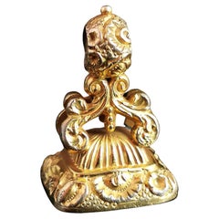 Pendentif ancien victorien à poignée en forme de sceau en cornaline avec boîtier en or