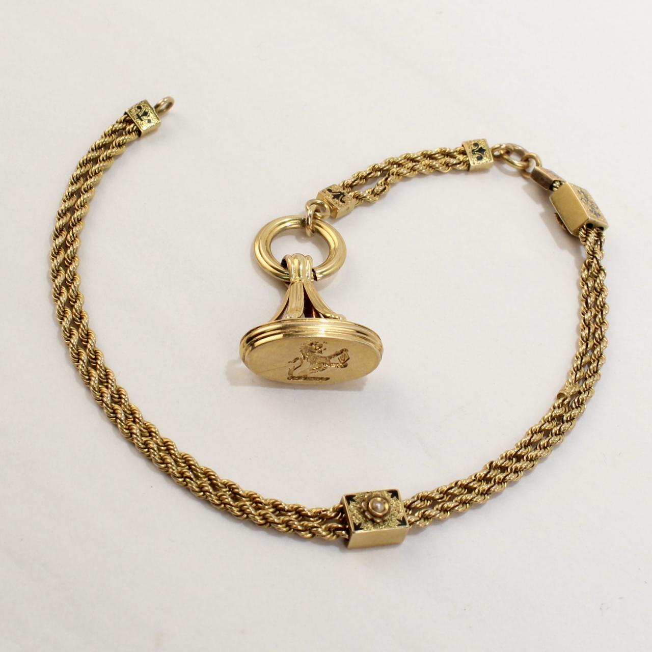 Antique Victorian Gold and Enamel Watch Chain with Slides and a Fob Seal In Good Condition For Sale In Philadelphia, PA