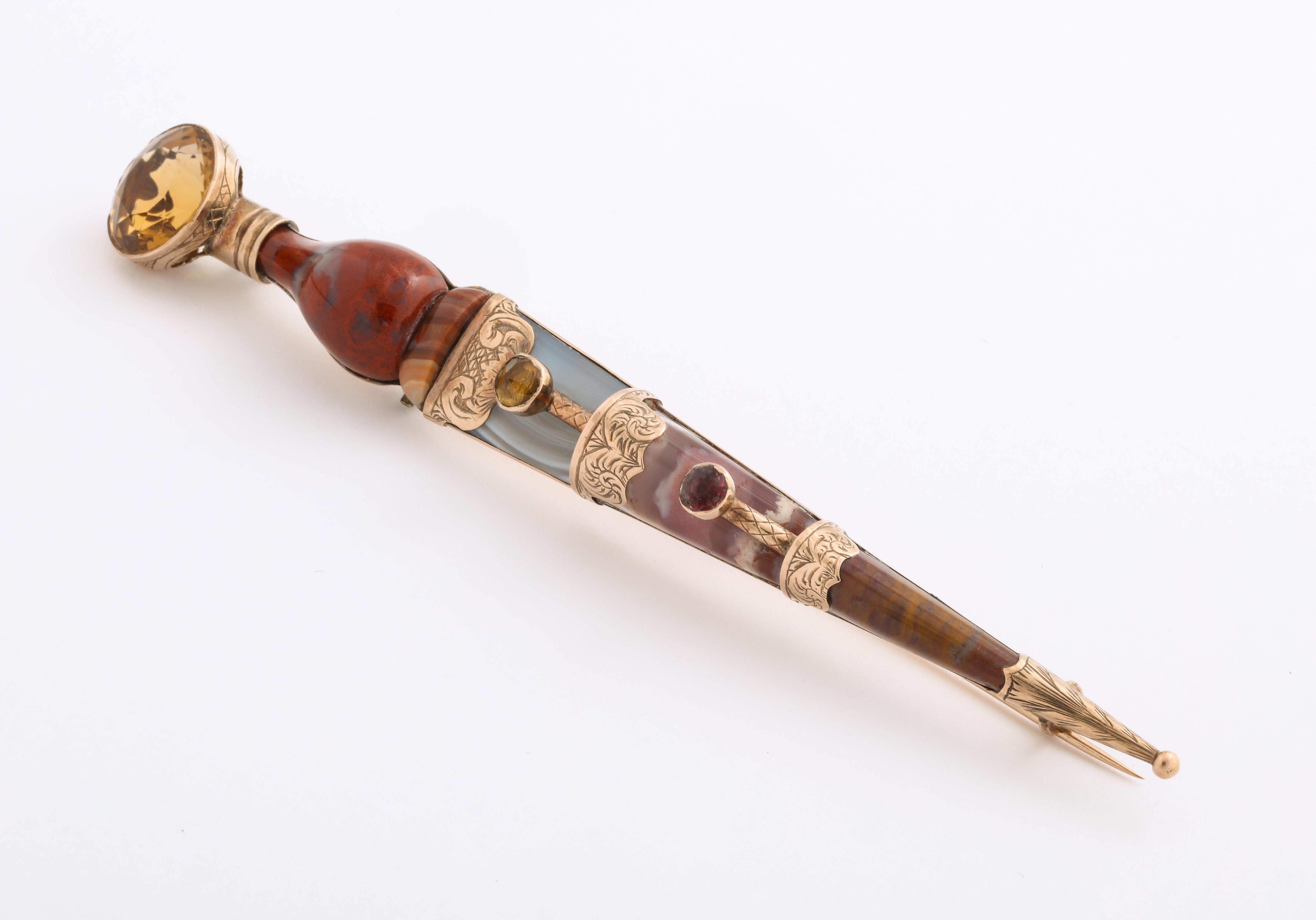 Gold engraving separates the specimen agates and citrine of this high quality and rare Scottish Dirk. It is a masterpiece of Victorian Jewelry. Scottish agate was created in various qualities, a large number for those who took the grand tour and