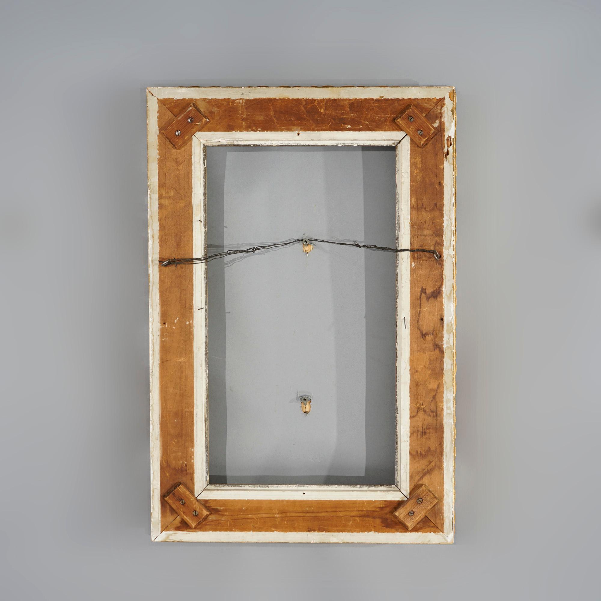 Un cadre de peinture victorien antique offre une construction en bois doré avec des éléments de feuillage, de volutes et de godrons en relief, vers 1890.

Mesures- total 24.5''H x 16.5''W x 2.75''D ; vue 18.5'' x 10.5''.

Note sur le catalogue :