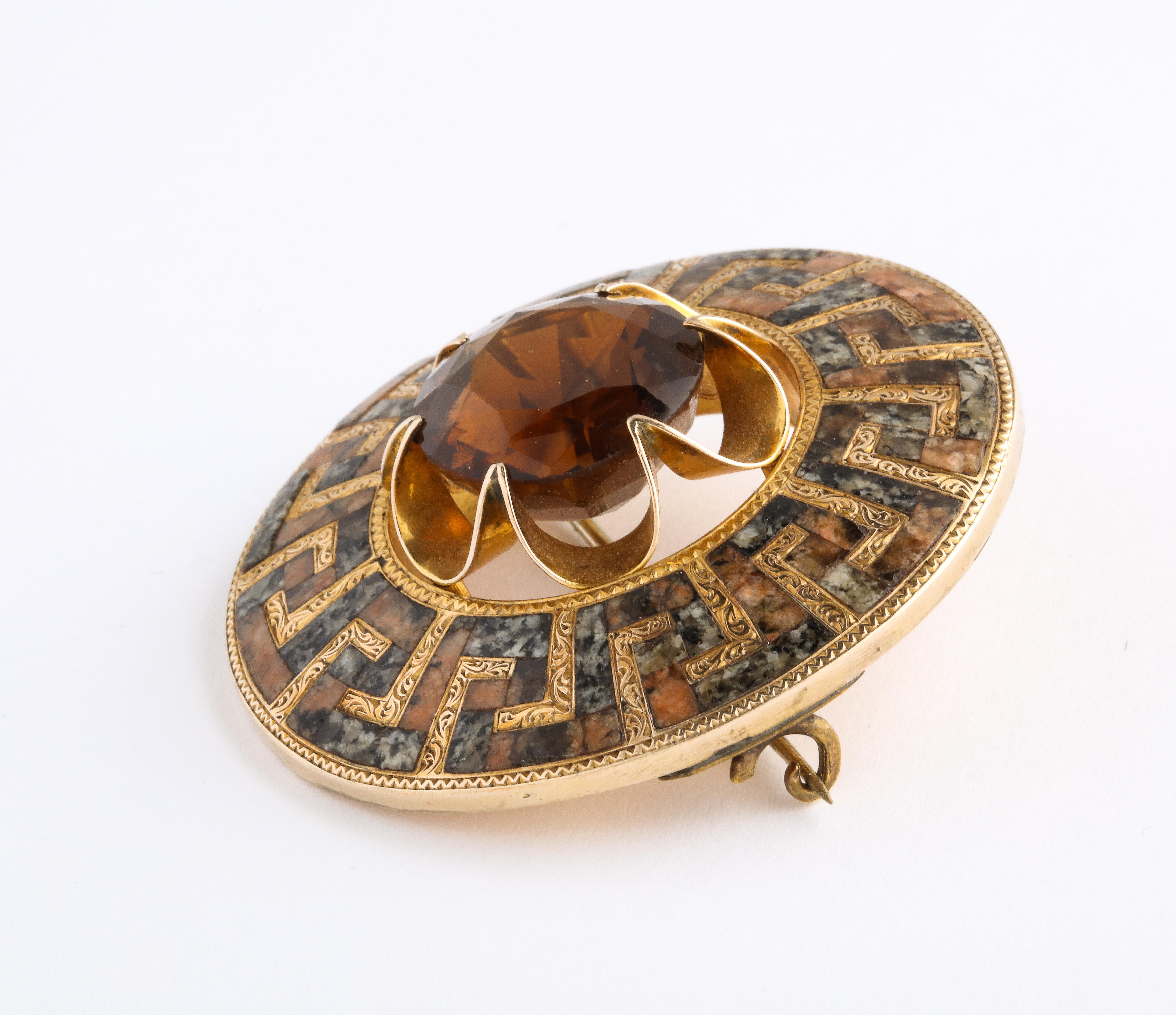 Dazzling gold and agate Scottish brooch made with an undulating Greek Key pattern in gold and granite with a flower burst large citrine pulling you in to the center. One of the most beautiful Scottish brooches I have found was artist made between