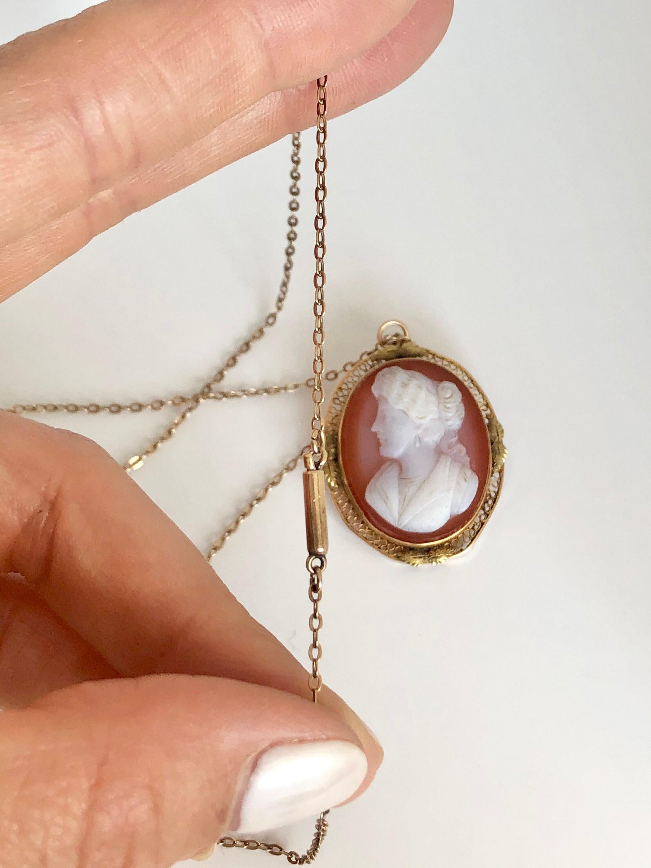 Victorian Cameo Necklace 

Beautiful Hardstone Cameo 
Filigree detailing, two colour gold. Rose gold & Yellow gold leaves. 

Lovely Barrel Clasp 

Chain marked 10ct Gold 

Cameo is set in 10ct Gold

Relief is in perfect condition.

Circa 1890