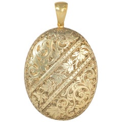 Antique Victorian Gold Pendant Locket with Chased Scroll Work and Leaves