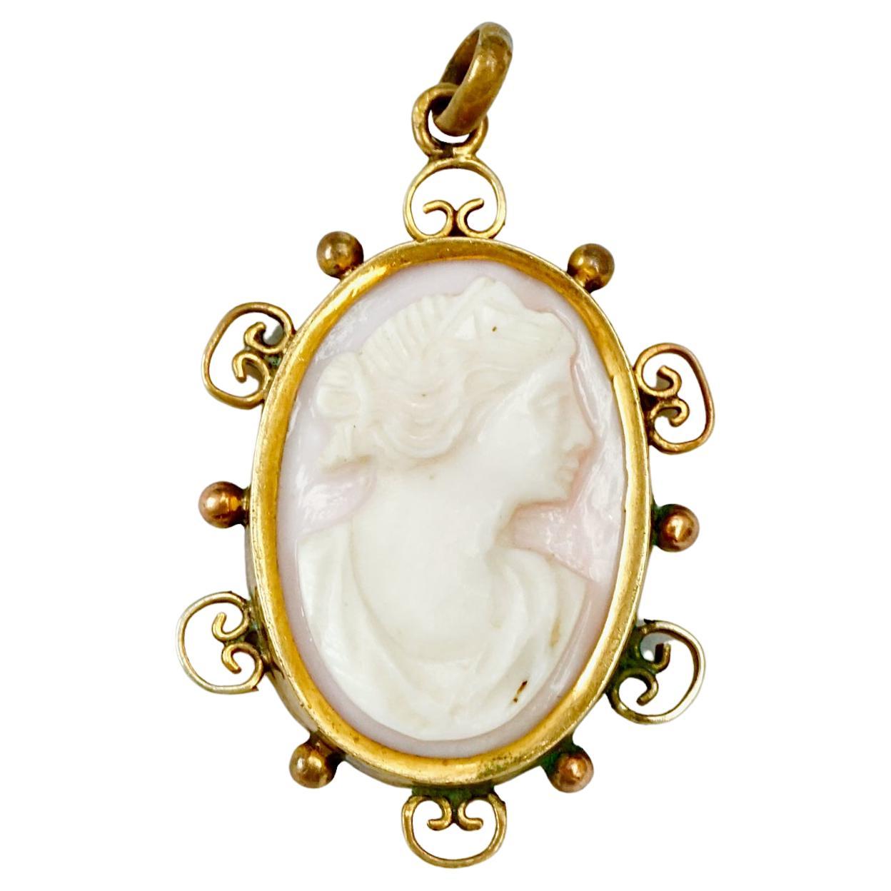 Antique Victorian Gold Plated Carved Angel Skin Coral Lady Cameo Pendant  For Sale