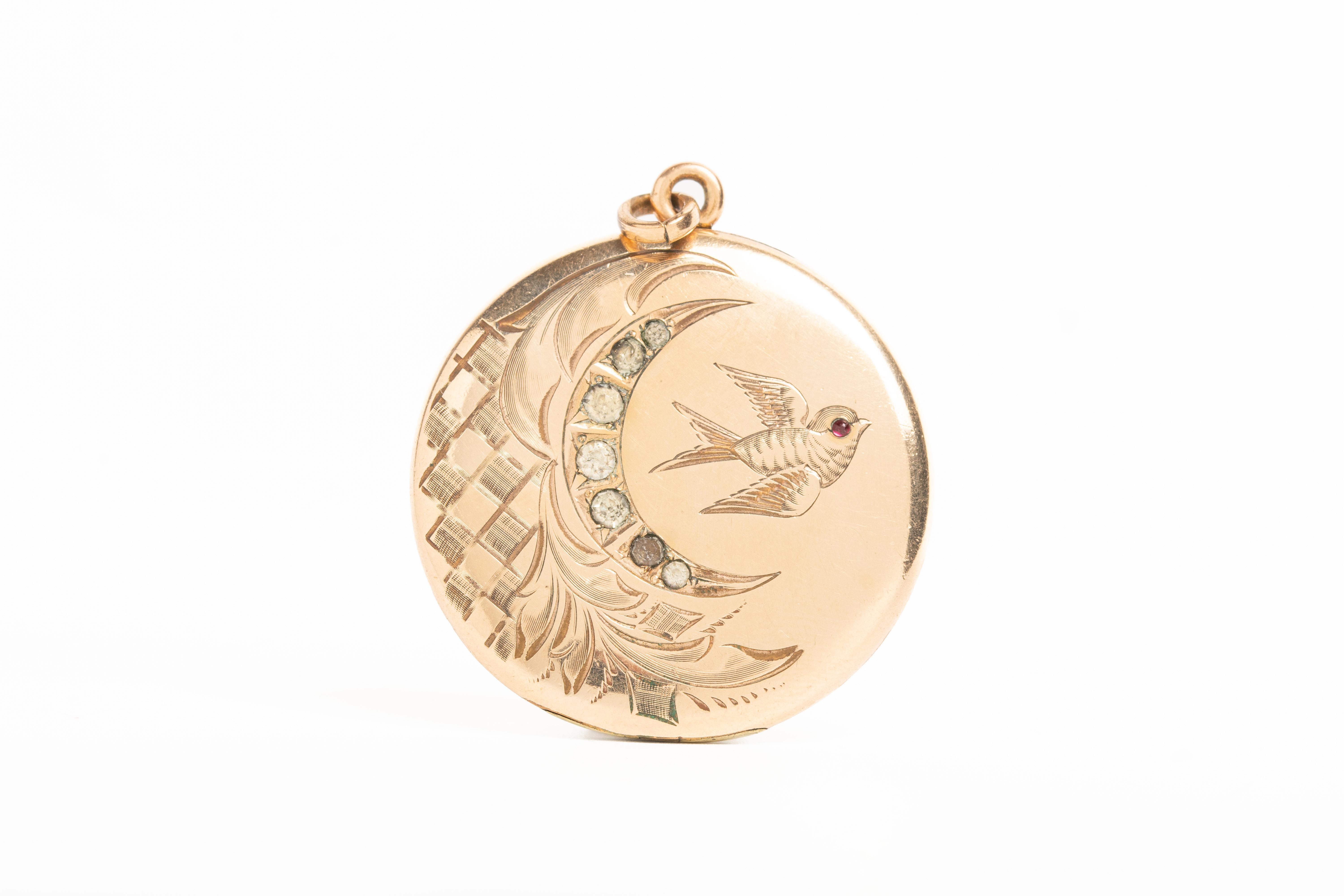 This rare antique Victorian crescent moon and a swallow locket was made circa 1890. Beautifully engraved with a crescent moon, a very popular symbol in Victorian jewellery and a symbol of changing of the seasons in one's life. 

Crescent moons also