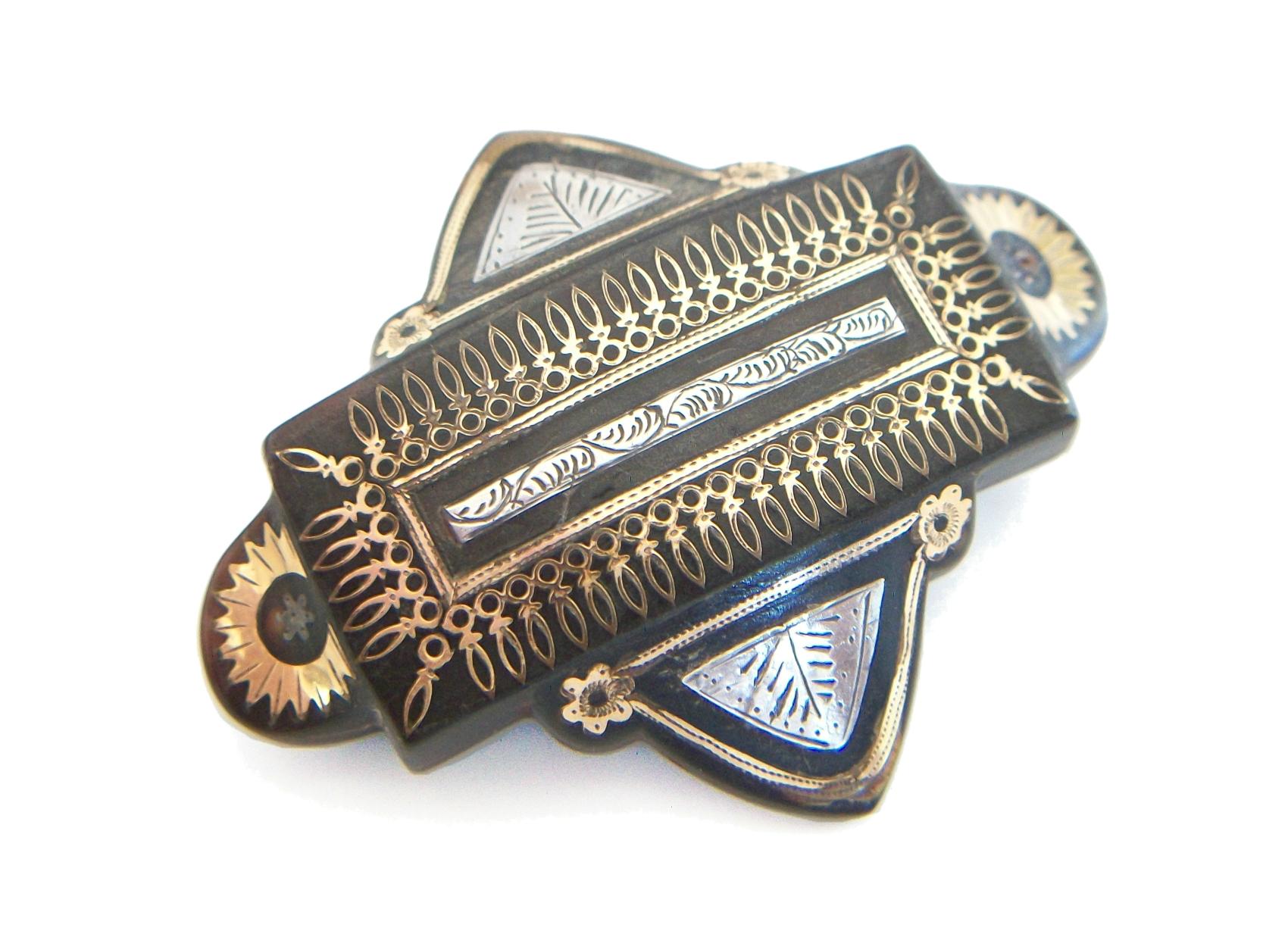 Antique Victorian gold and silver piqué brooch - large size - museum quality - intricately set with hand tooled and engraved panels and elements - original 'C' catch - original hand made tube hinge and pin - unsigned - United Kingdom - circa