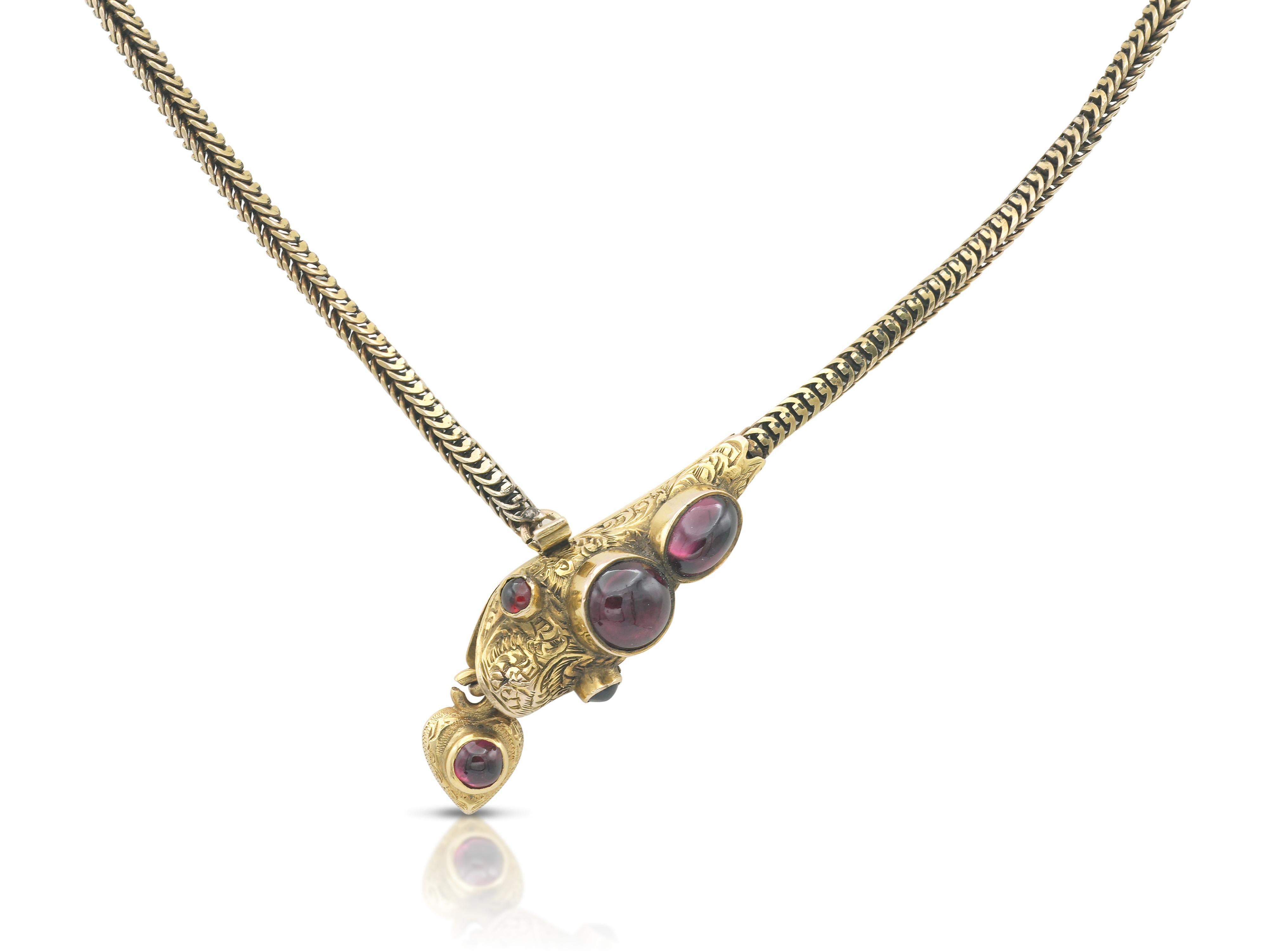 Finement réalisé en or jaune 15k avec des tourmalines cabochon.
Fin des années 1800.
14 1/2 pouces de long
Livré avec sa boîte d'origine.