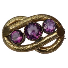 Antica spilla vittoriana in oro e finta ametista incisa a mano