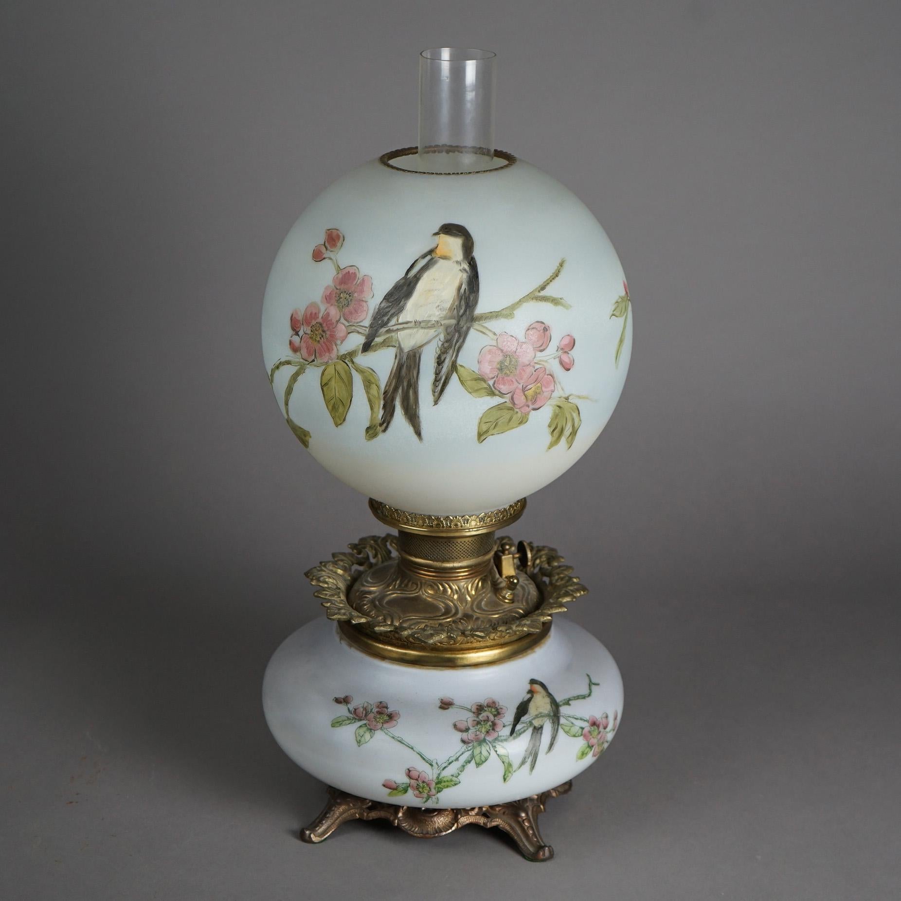 An antique Victorian Gone With The Wind parlor lamp offers glass shade and base with hand painted swallow and flowers, c1890

Measures- 21.5''H x 9.75''W x 9.75''D