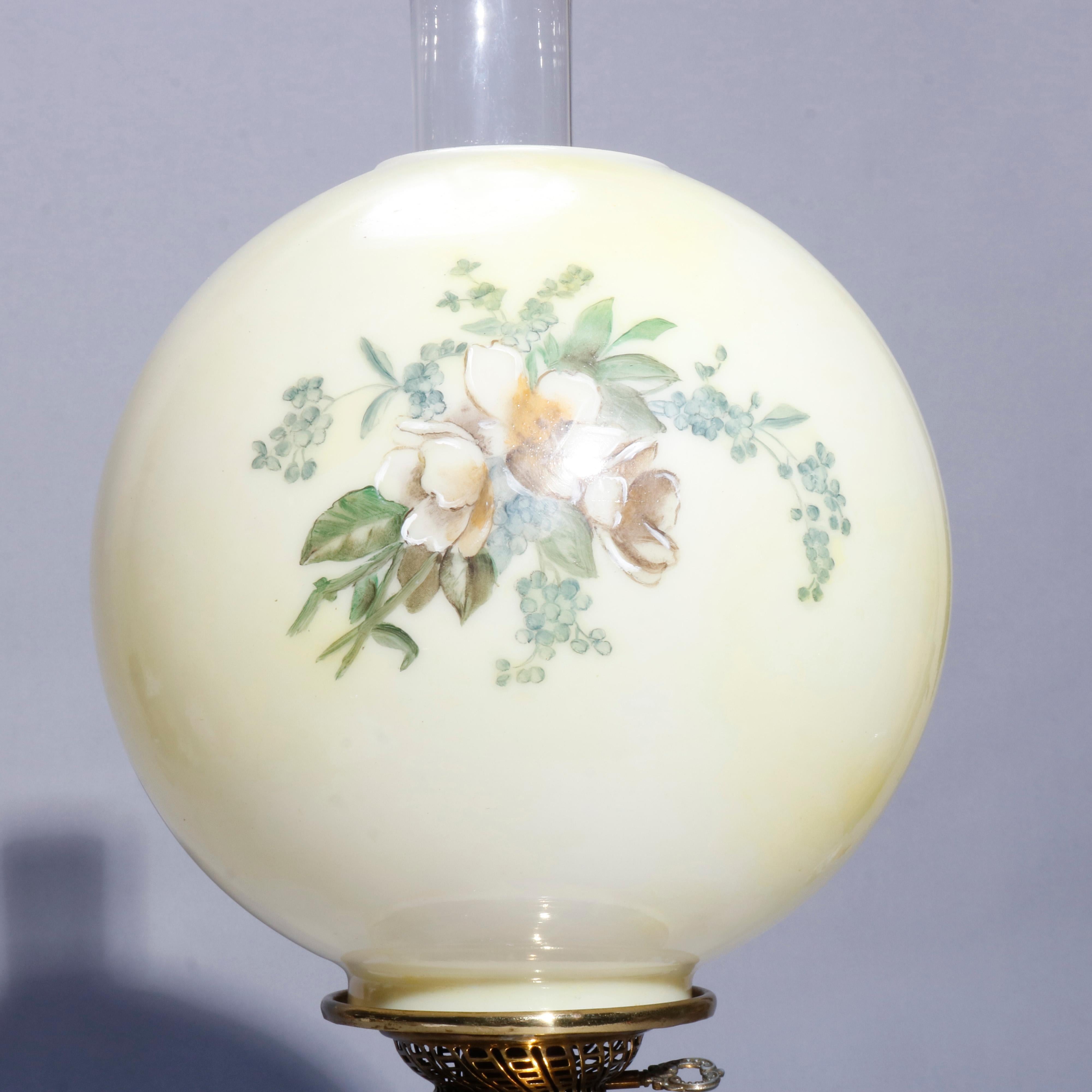 An antique Victorian gone with the wind parlor lamp offers floral painted shade and base, both base and lamp light independently, circa 1890

Measures: 25
