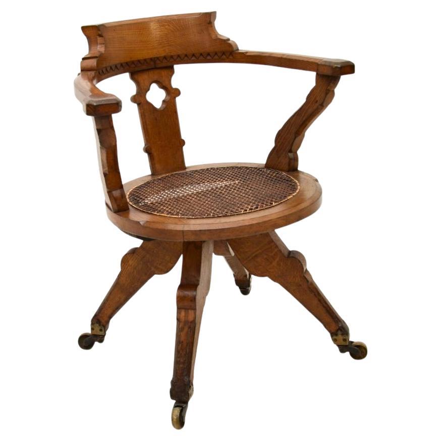 Antique Victorian Gothic Revival Solid Oak Swivel Desk Chair