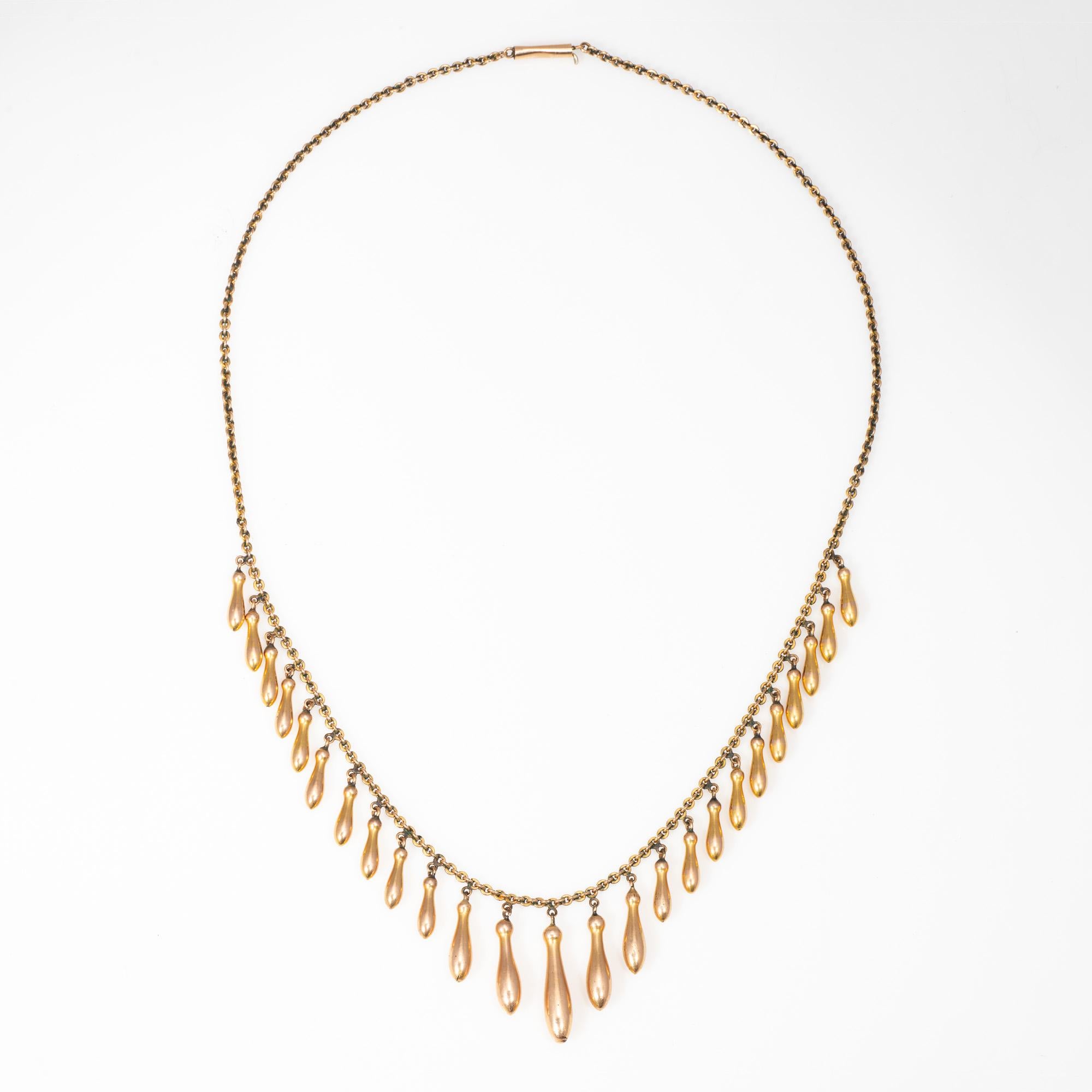 Finely detailed antique Victorian graduated fringe necklace (circa 1880s to 1900s), crafted in 10 karat rose gold. 

A graduated fringe of tubular drops measure from 1/2 to 3/4 inches. The necklace is a testament to fine jewelry of the era and is in