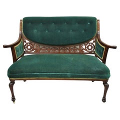 Antique Victorian Green Mohair Fretwork Carved Mahogany Parlor Loveseat Settee