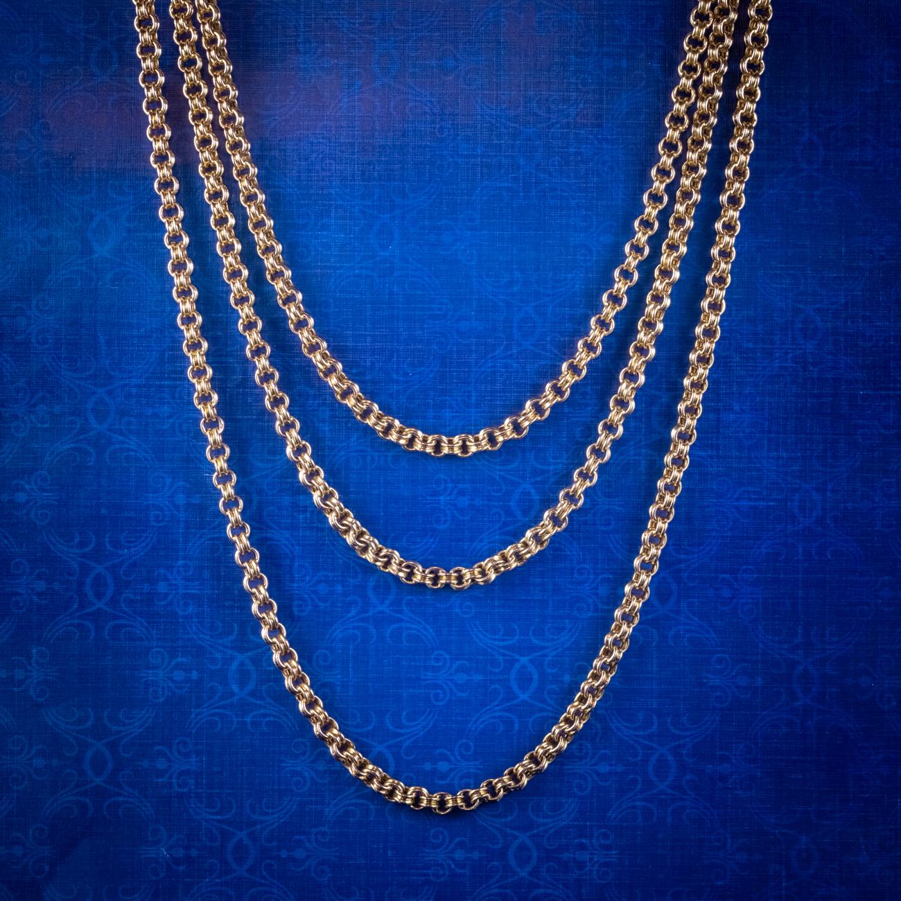 A grand antique Victorian Guard chain from the late 19th Century consisting of solid 15ct yellow gold cable links that articulate fluidly together.

It's a generous length, measuring 62 inches in total and can be worn as one long chain or looped two