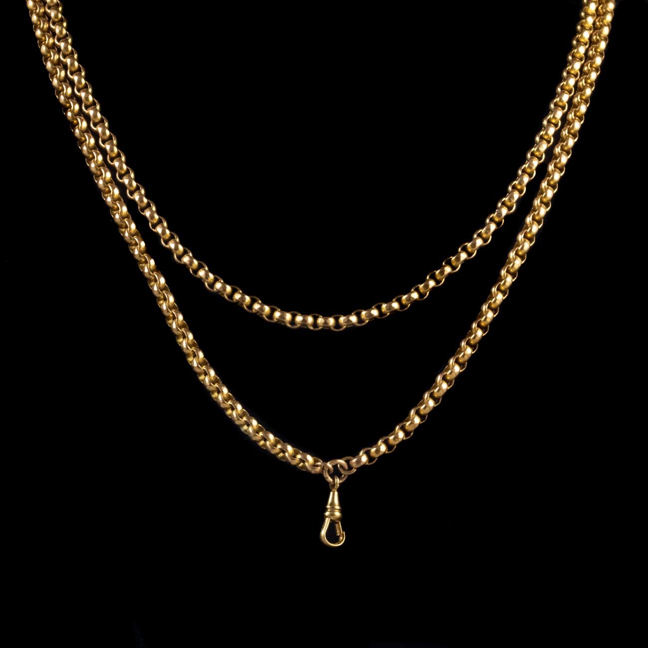 A fabulous Antique Victorian long guard chain modelled in Silver gilded in 18ct Yellow Gold, featuring beautifully crafted faceted links.

The chain is complete with a large trigger clasp at the end which may have been used to attach a pocket watch