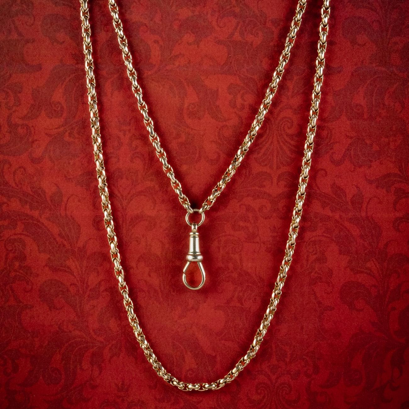 A grand antique Victorian guard chain from the late 19th Century made up of beautiful, faceted cable links crafted in 9ct gold, with a claw clasp hung at the bottom.  

Guard chains were at the height of popularity in the 18th & 19th Century. Both