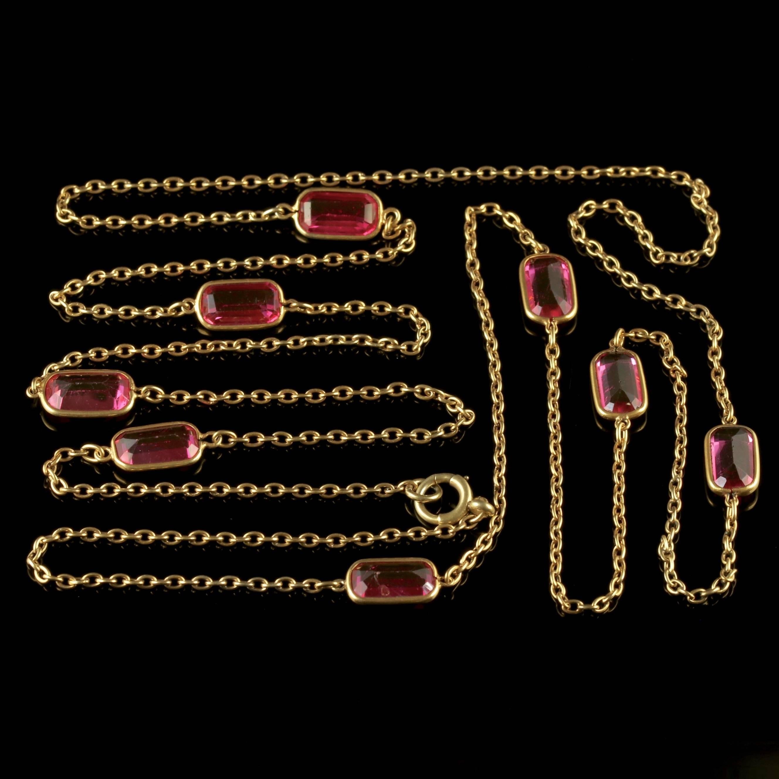 To read more please click continue reading below-

This fabulous long antique Victorian pink Paste Guard chain is Victorian, Circa 1900. 

The chain is long and beautifully made, displaying lovely Pink Paste Stones running down the length of the