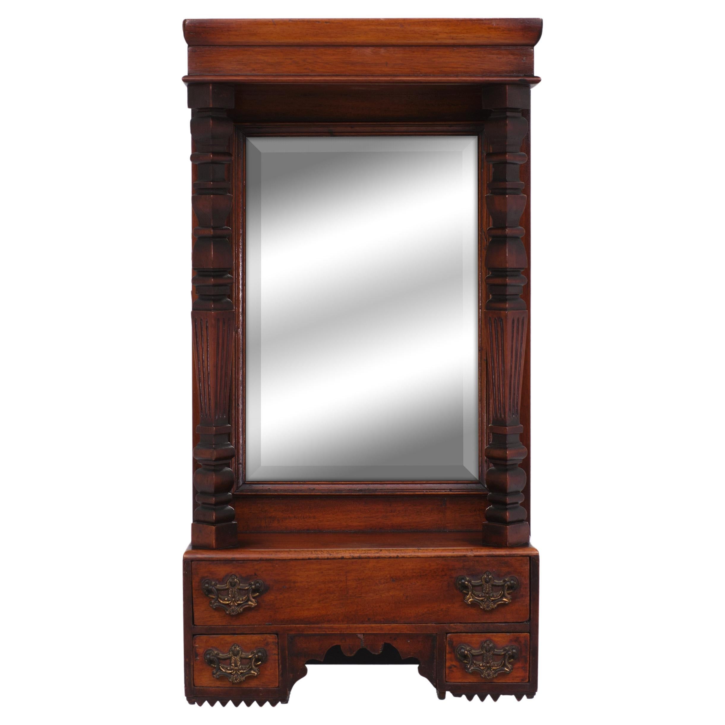 Very nice Victorian Hall Mirror. Wall Hanging. Mahogany Three drawers. Beveled mirror.
Gilded Bronze handles. Beathiful patine. Superb color.