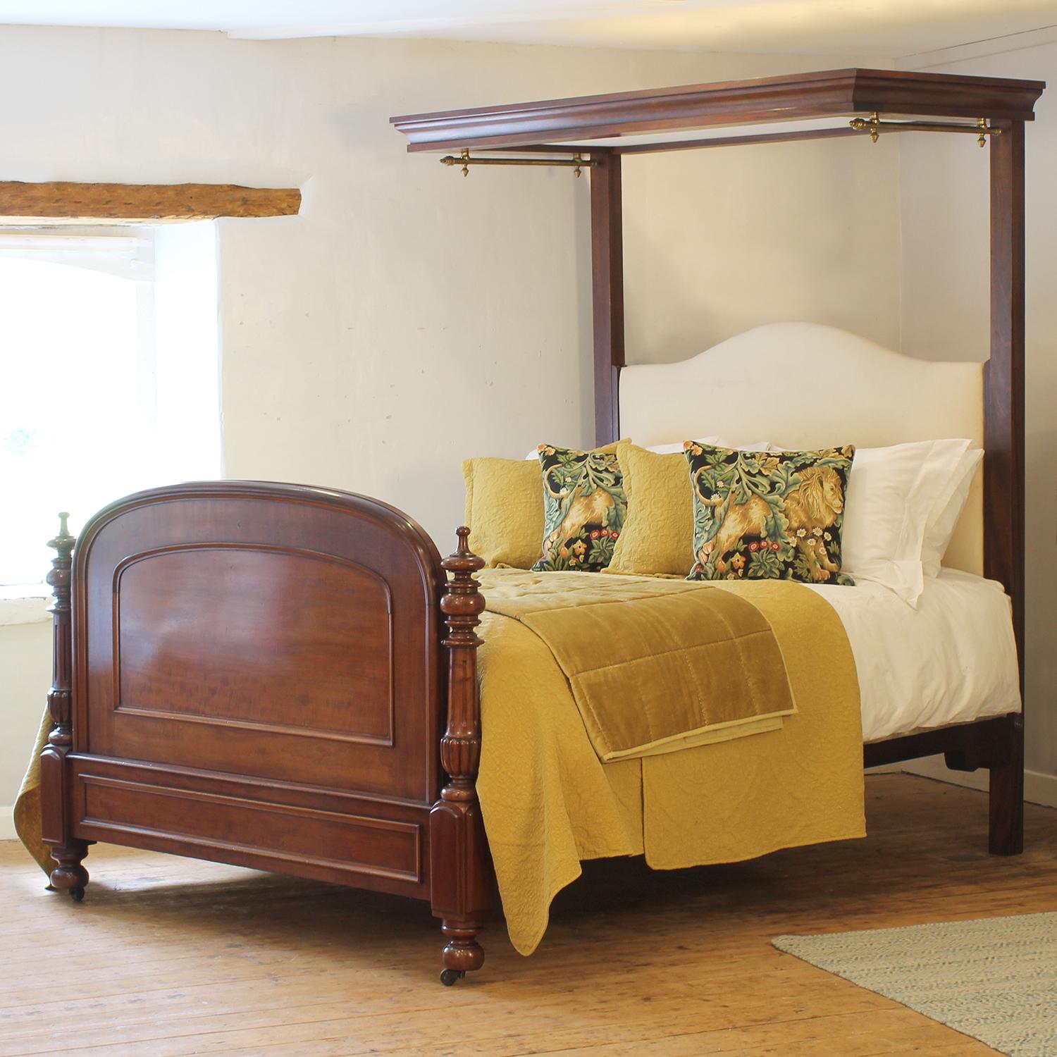 A magnificent Victorian half tester bed with arched foot panel, turned posts and rectangular canopy with rails to support drapes, which we can provide.
The upholstered back panel can be covered with a fabric of your chice. We also supply a canopy