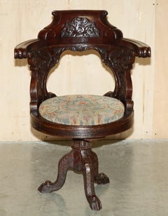ANTIQUE VICTORIAN HAND CARVED HARDWOOD SHIPs CAPTAINS CAST IRON BASE ARMCHAIR