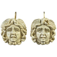 Antique Victorian Hand Carved Lava Stone Medusa Earrings, circa 1850