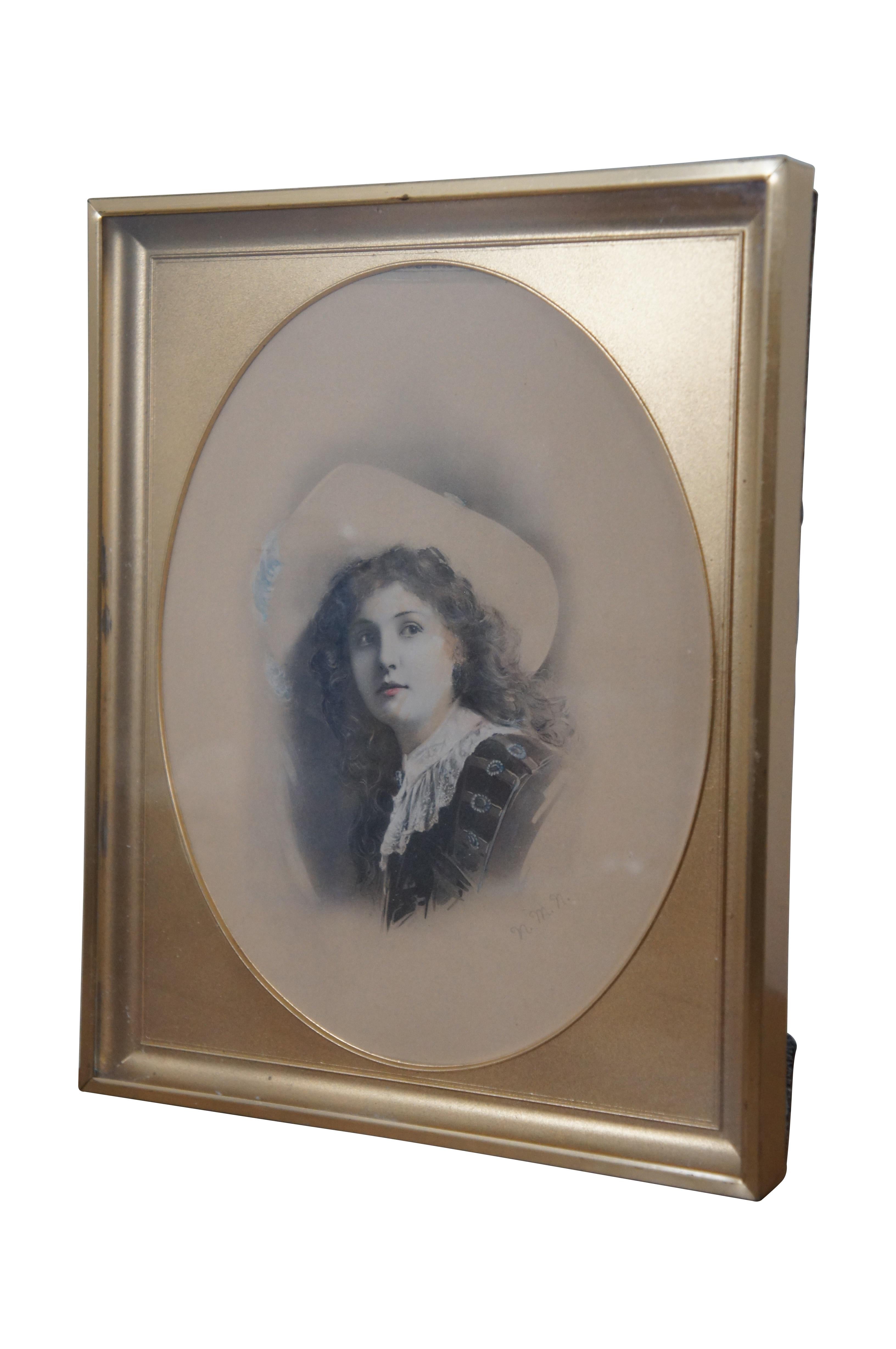 Antique hand colored oval portrait print of a young girl in a large hat and wide lace collar. Pencil signed N.M.N. Framed in a beveled, gilded frame and mat.

Dimensions:
9.125