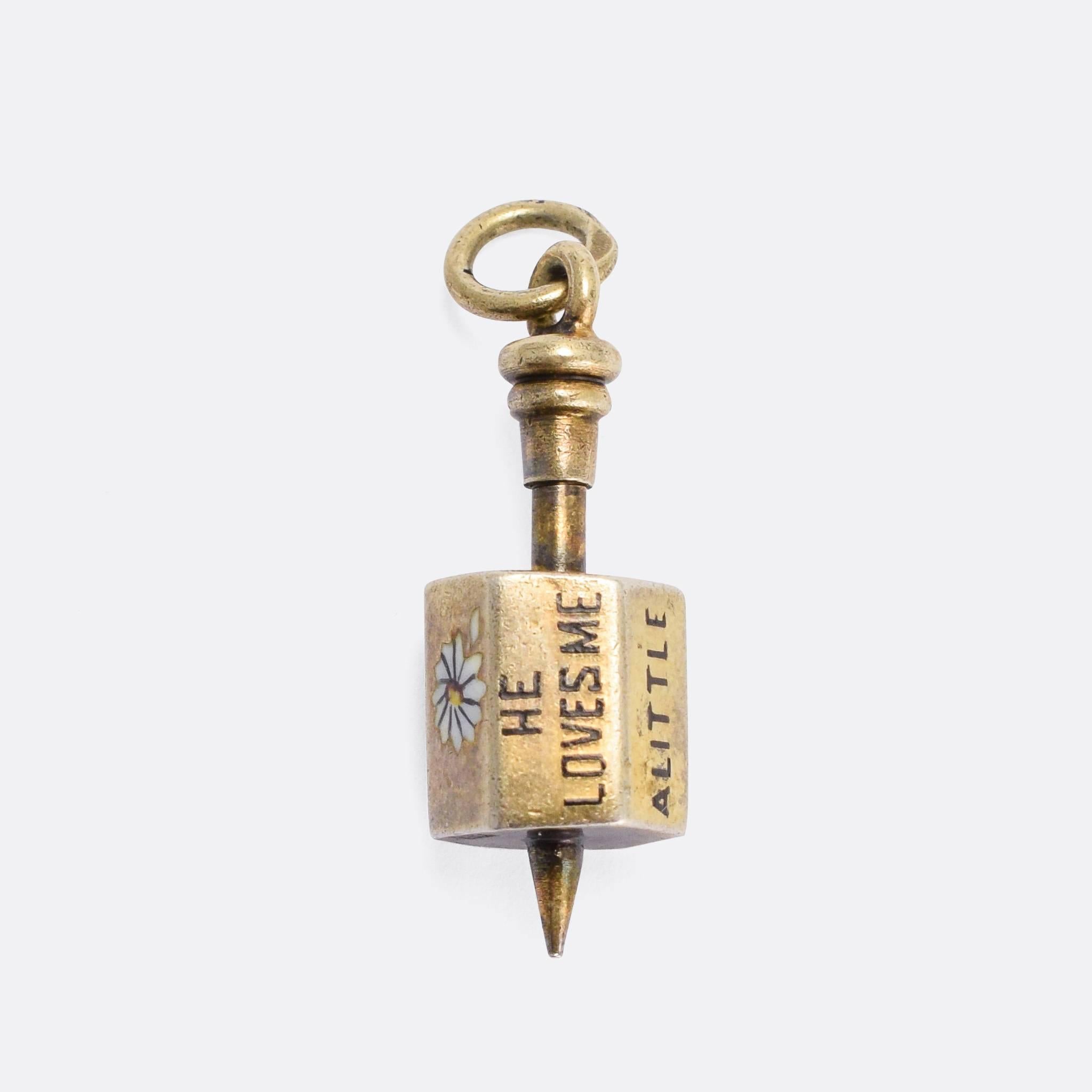 A very unusual antique pendant, modelled as a spinning top. The pendant bail screws off, allowing the body to be spun on the point. When it comes to rest, a message is displayed on the top side:

He Loves Me / A Little / Much / Passionately / He