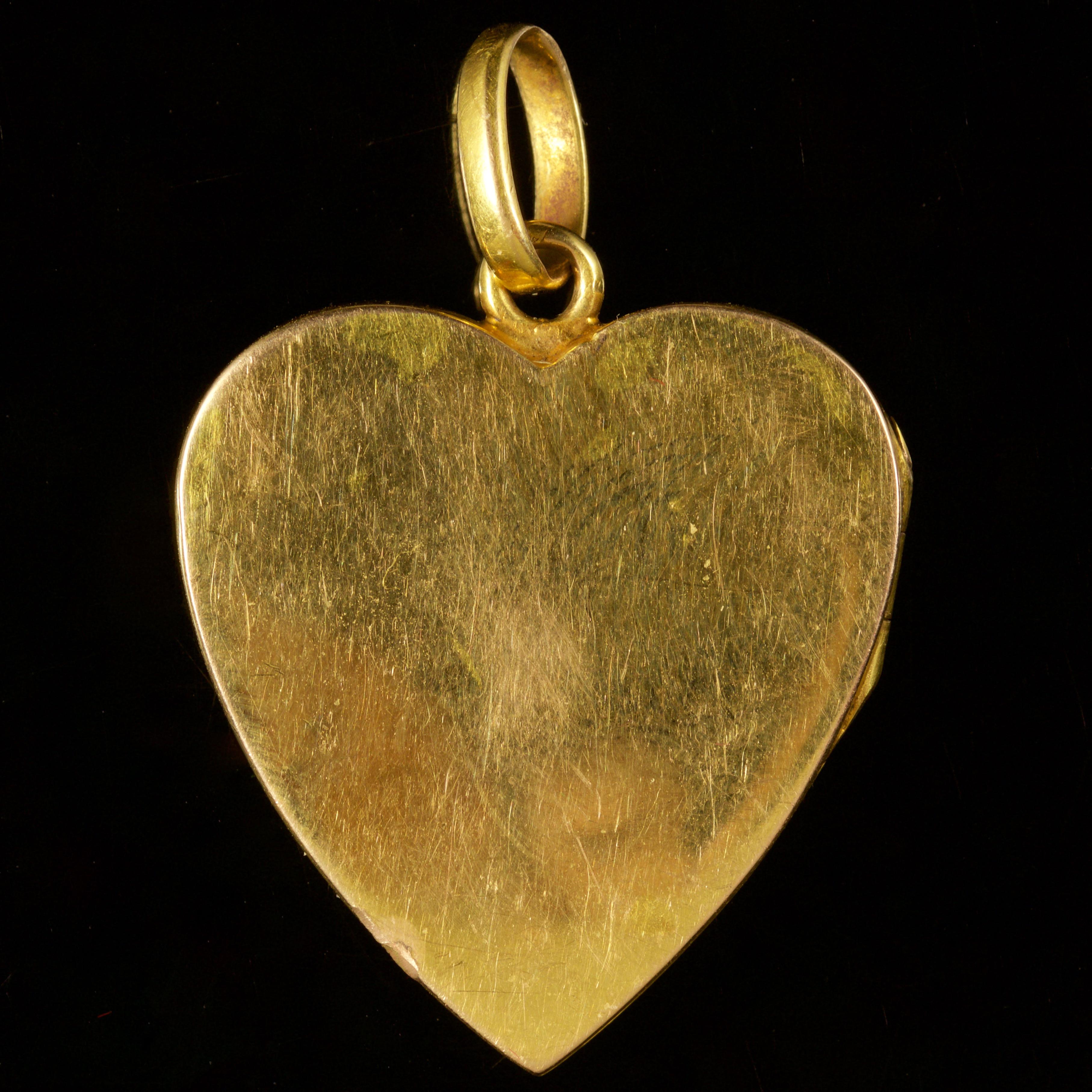 This beautiful Victorian 18ct Gold heart locket is, Circa 1880.

The locket is fabulous, it displays an insect which is decorated in sparkling Diamonds, a Sapphire body and 2 Ruby eyes.

Diamonds sparkle continuously and beautifully captivating the