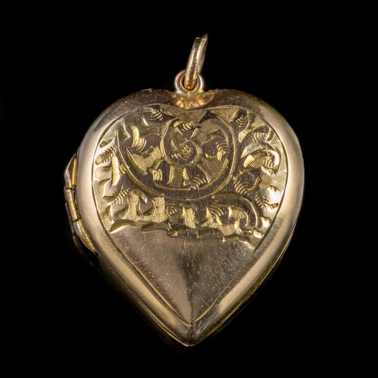 This beautiful Antique Victorian heart shaped locket has been modelled with a 9ct Yellow Gold front and back. It features incredibly detailed engraving on the front in a foliate design.

Hearts were a popular motif in the Victorian era and of course