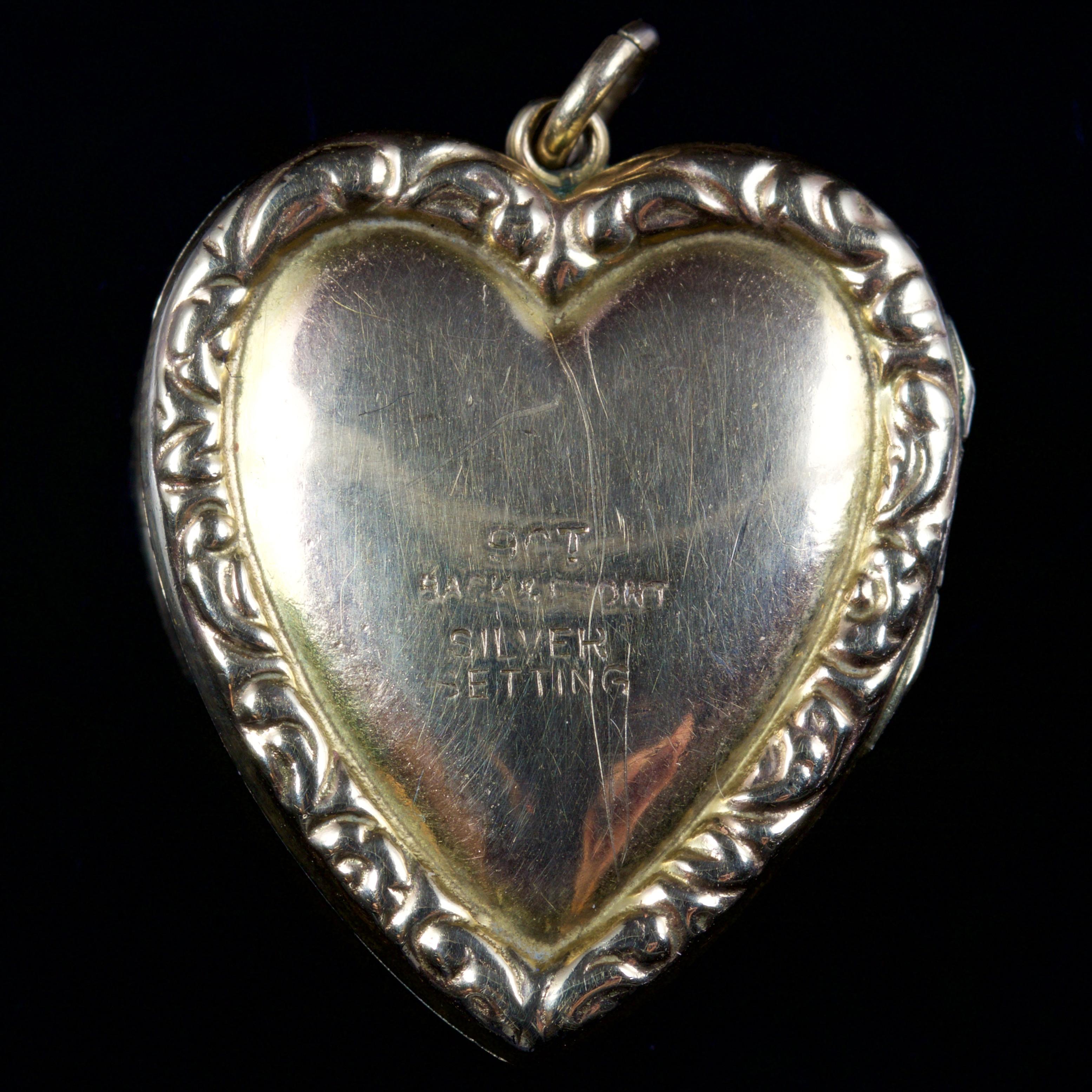 This beautiful Victorian Garnet and Pearl heart locket is, Circa 1900.

The locket displays a cluster of Garnets in the centre, surrounded by engraved leaves with lustrous Pearls set into them.

It is set in 9ct Gold and a Silver.

The Garnet is a