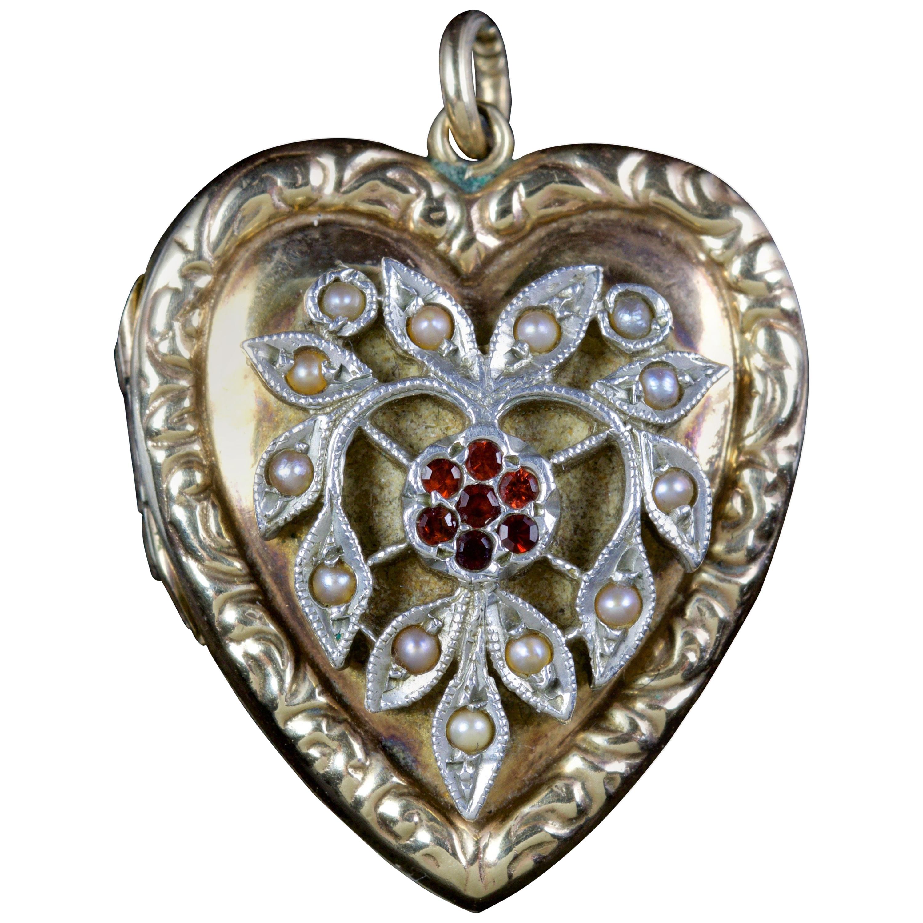 Antique Victorian Heart Locket Garnet Pearl 9 Carat Silver, circa 1900