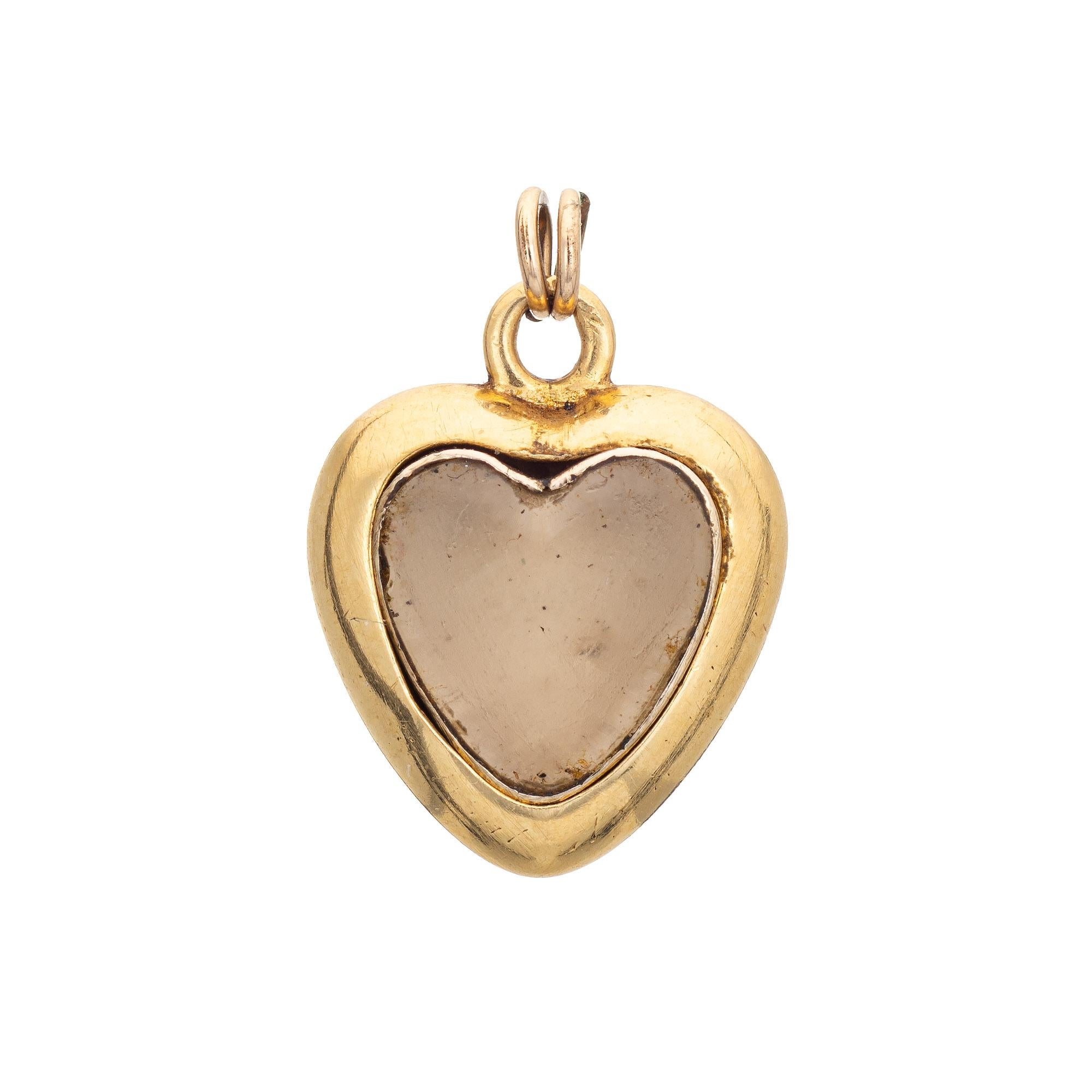 Finely detailed antique Victorian guilloche enamel heart pendant (circa 1880s to 1900s) crafted in 18 karat yellow gold. 

One 3.5mm pearl is set to the center, accented with six estimated 0.01 carat old rose cut diamonds (estimated at J-K color and