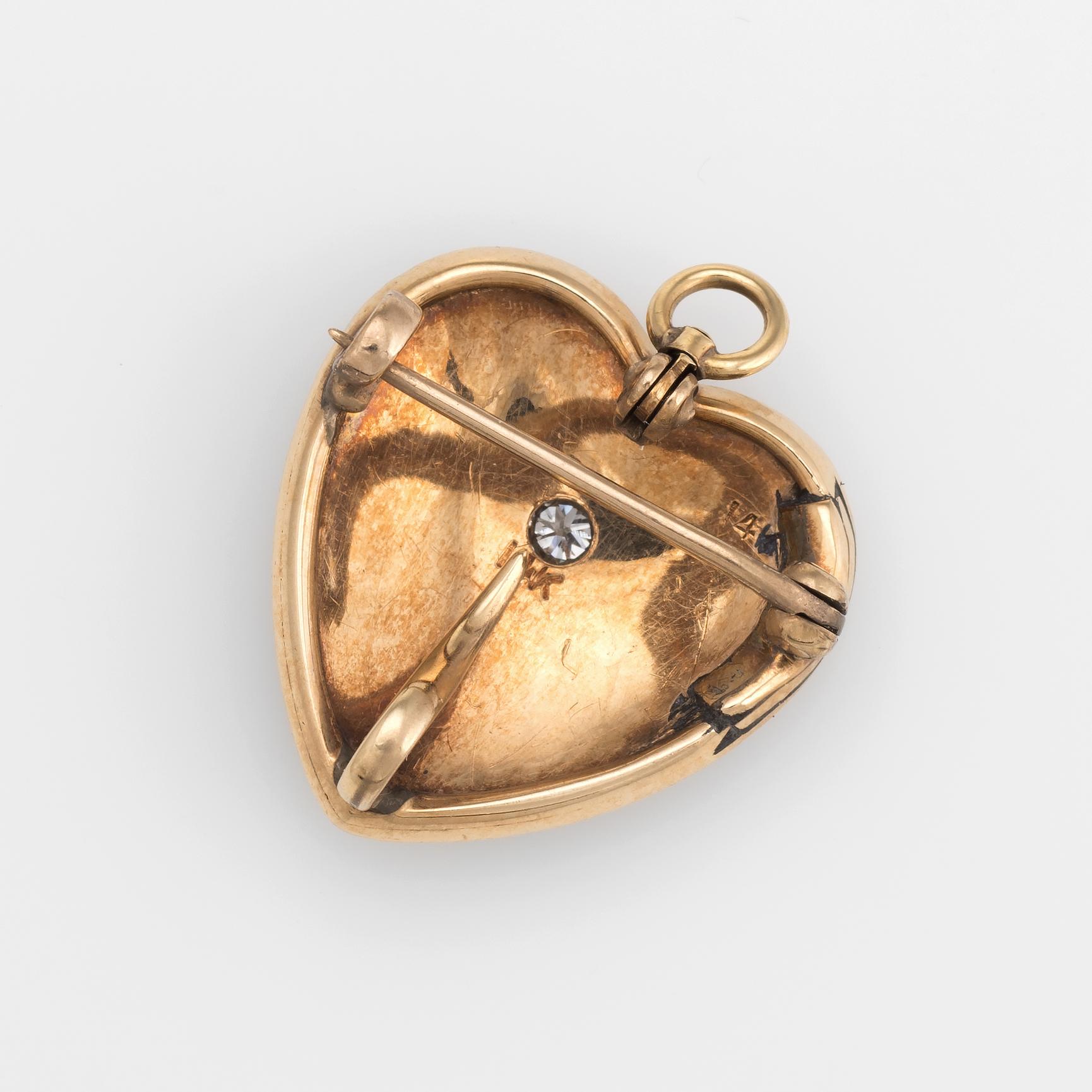 Elegant and finely detailed antique Victorian heart pendant & brooch (circa 1880s to 1900s), crafted in 14k rose gold. 

One estimated 0.06 carat old mine cut diamond adorns the center of the heart (estimated at H-I color and SI1 clarity). The seed