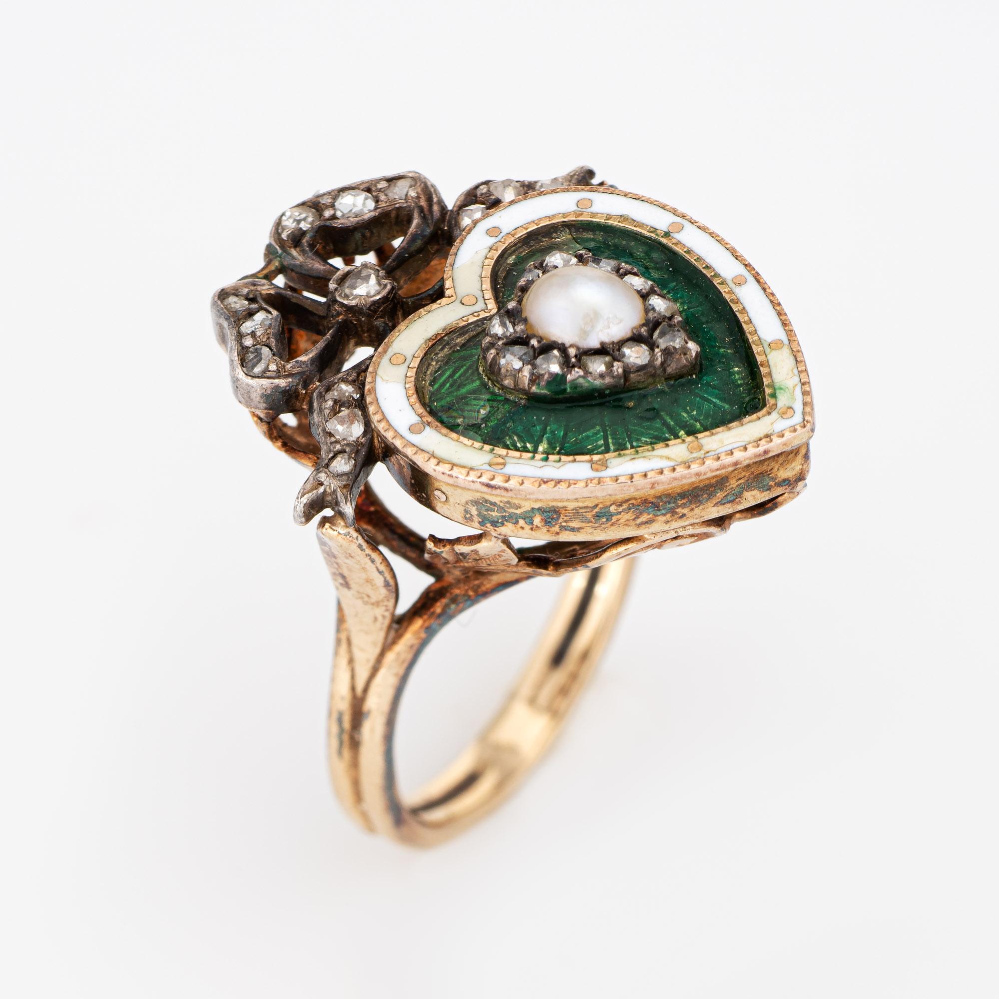 Finely detailed antique Victorian guilloche enamel diamond & pearl heart ring (circa 1880s to 1900s) crafted in 15 karat yellow gold, silver topped. 

The center set natural pearl measures 4.5mm x 4mm. 24 old rose cut diamonds total an estimated