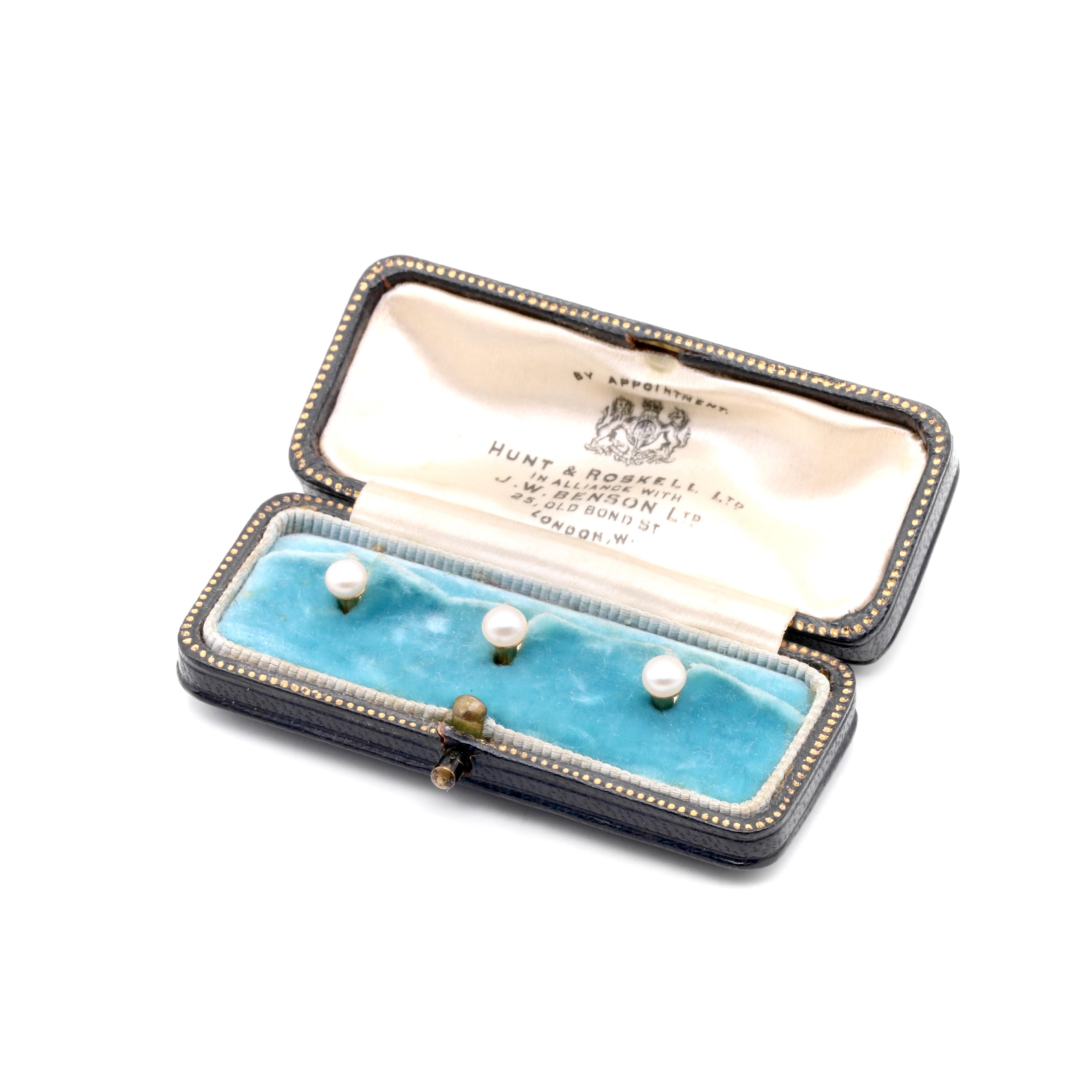 A set of three antique yellow gold and pearl dress studs, each comprising one pearl, in 15 karat yellow gold. 

My favourite thing about these Antique 15K Gold Pearl Dress Studs is the shimmering pearls. What’s yours? Perhaps the warm toned yellow