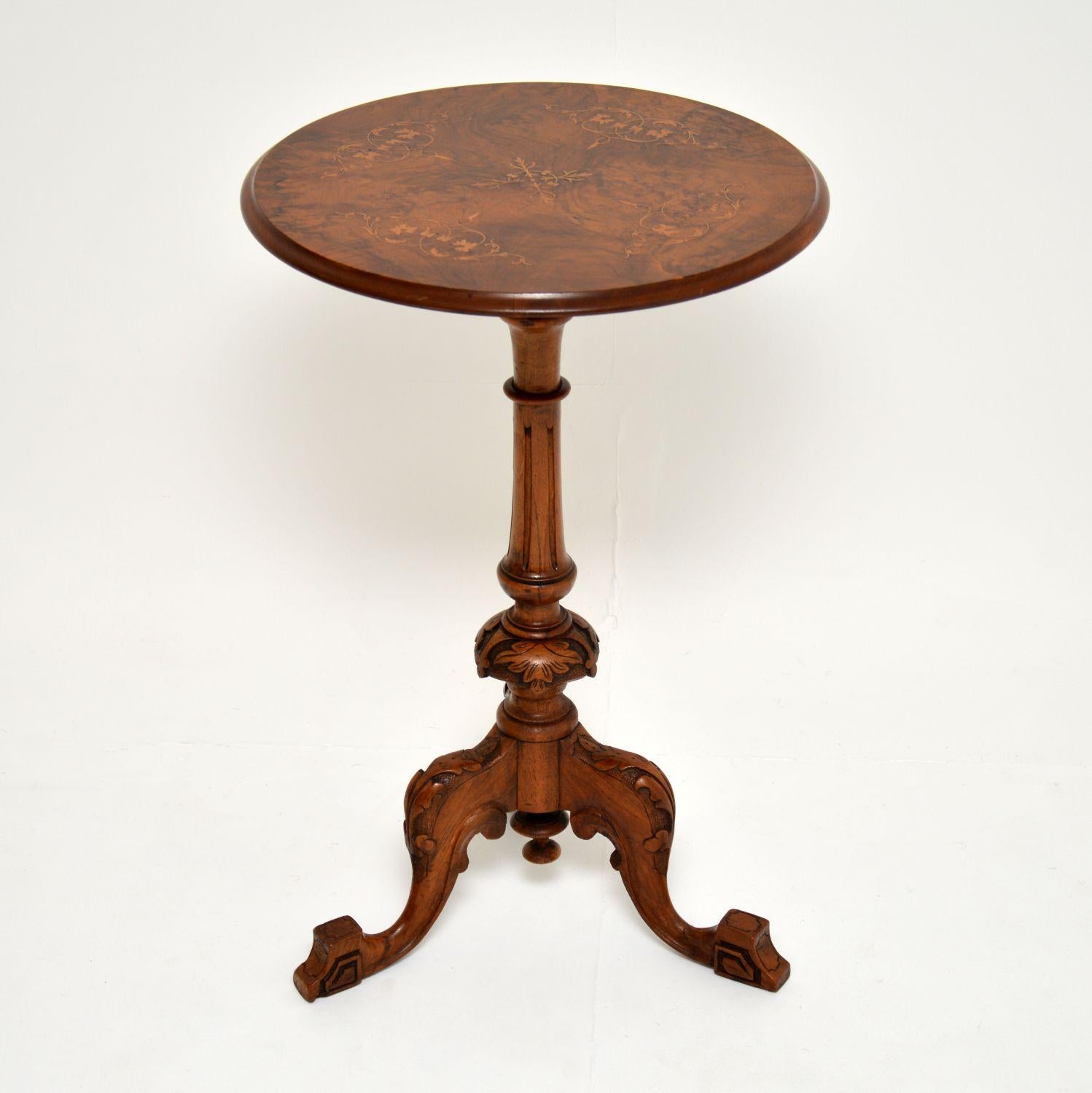 A stunning antique Victorian side table, this dates from circa 1860-1880 period.

This is of amazing quality, the circular top has beautiful burr walnut grain patterns, and is finely inlaid with satinwood Marquetry.

The tripod base is