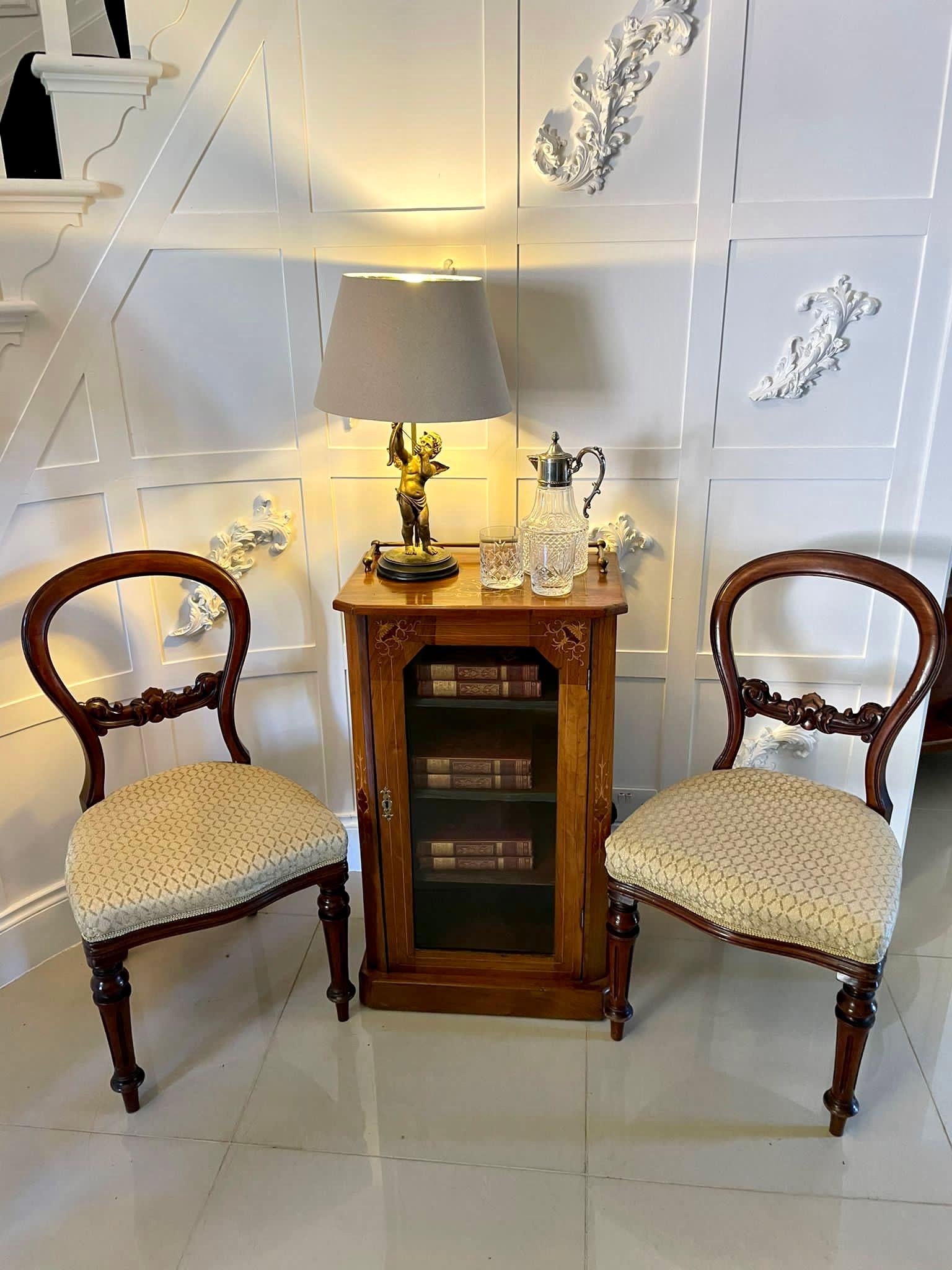 Antique Victorian inlaid walnut music cabinet having a pretty quality burr walnut inlaid top with original  brass gallery, walnut sides with canted corners with boxwood inlay, inlaid  walnut glazed door opening to reveal three shelves and standing