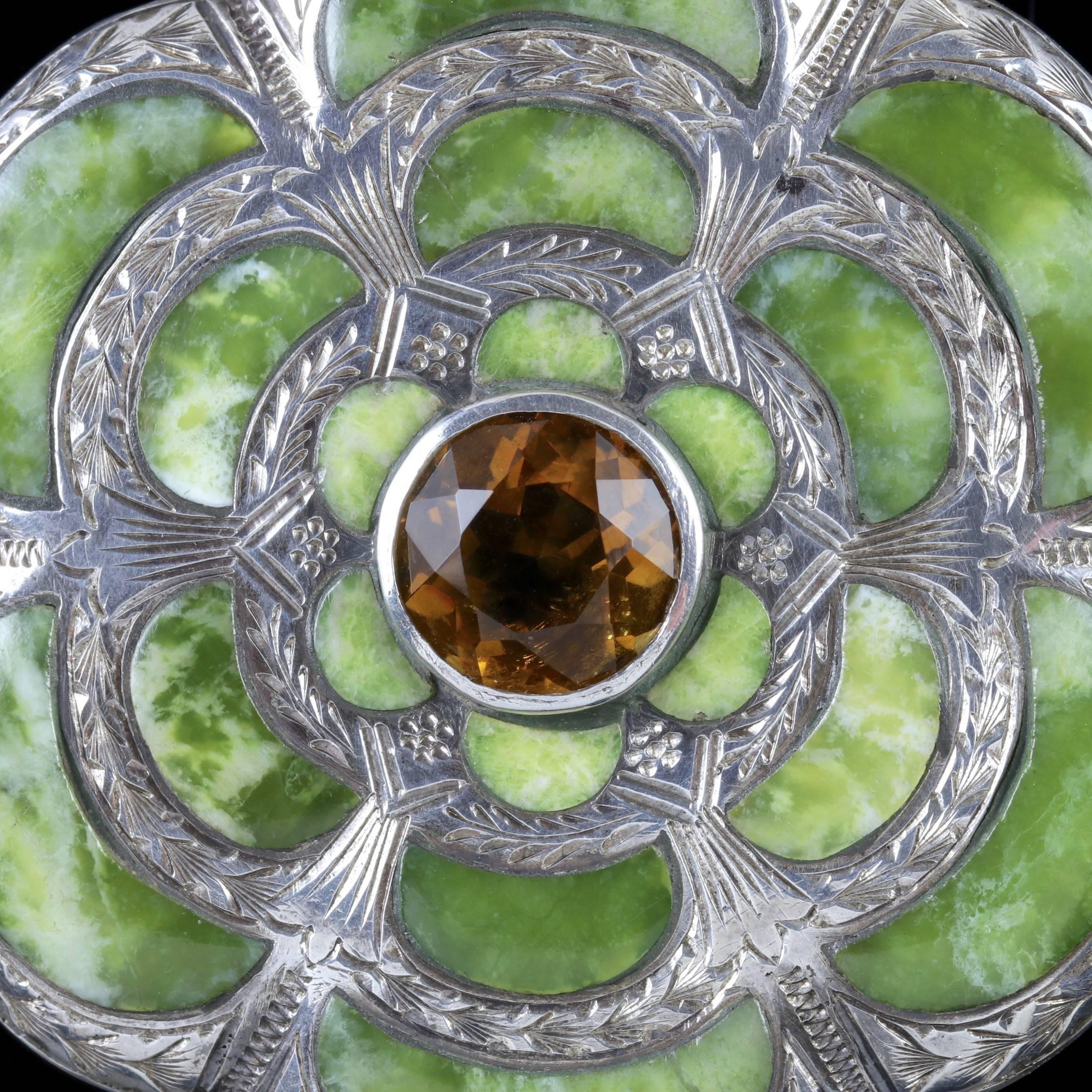 To read more please click continue reading below-

This beautiful large antique Victorian Irish Connemara Marble brooch is Circa 1860. 

The wonderful brooch is adorned with a gleaming Citrine in the centre and surrounded by fabulous green Marble