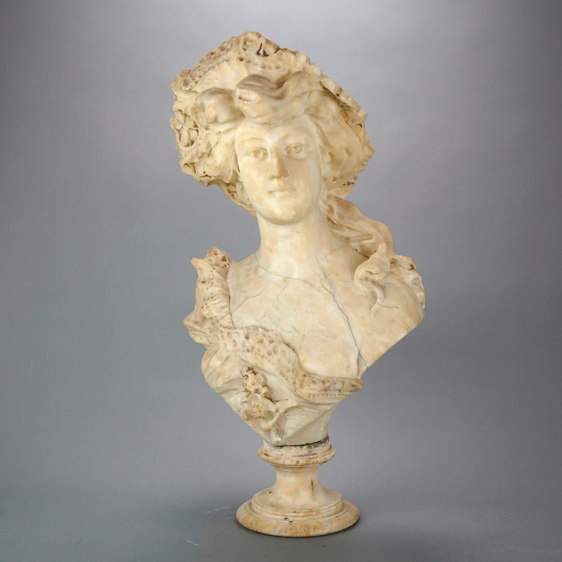 An Italian Victorian bust signed A. Cipriani offers carved marble portrait sculpture of a woman in a hat, signed as photographed, c1890

Measures- 28.5''H x 14''W x 10''D