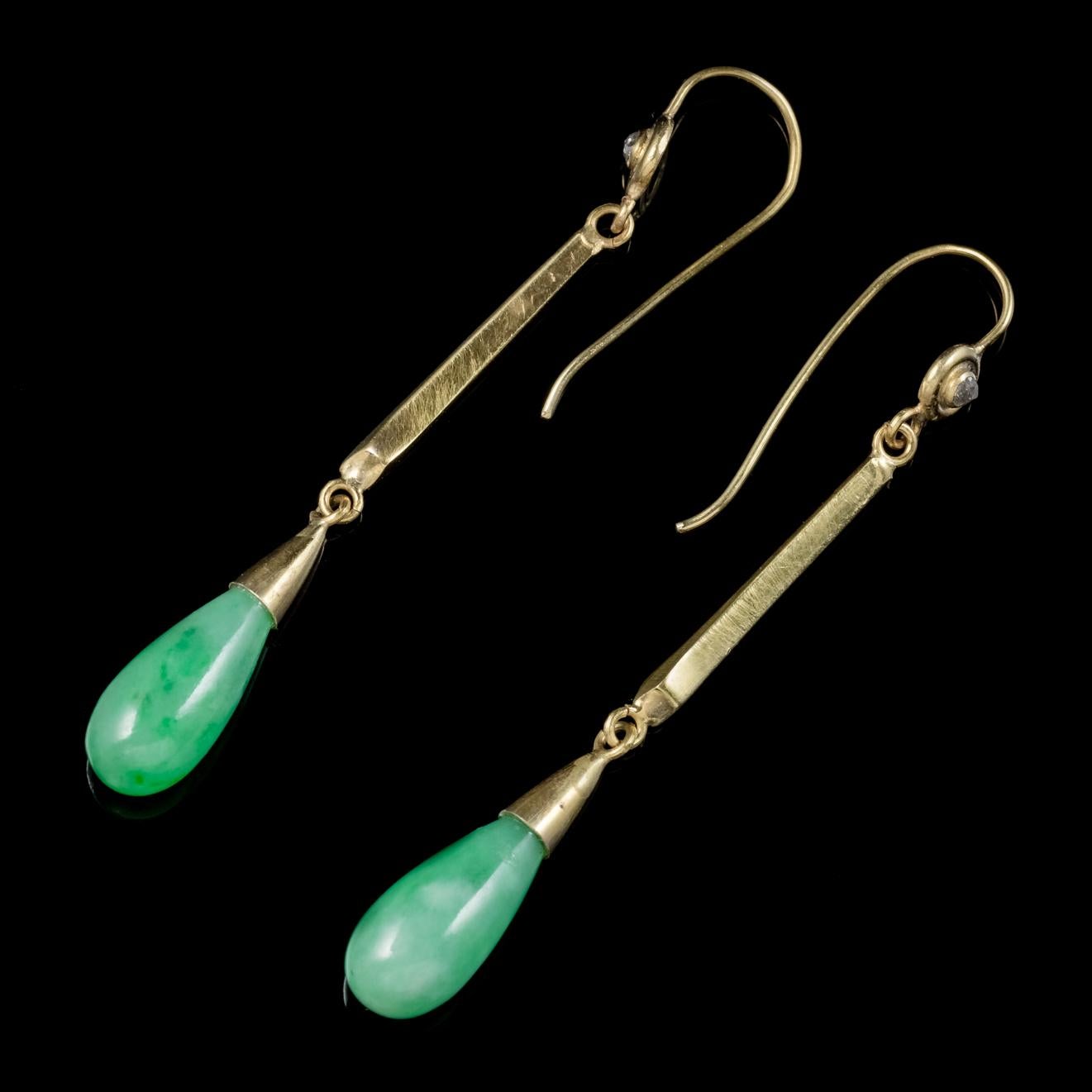 These spectacular antique double drop Jade earrings are Victorian, Circa 1900. 

A lovely teardrop Jade stone hangs from each earring, accompanied by a small Diamond nestled in the top gallery. 

Jade is considered the ultimate ‘Dream Stone’ and has