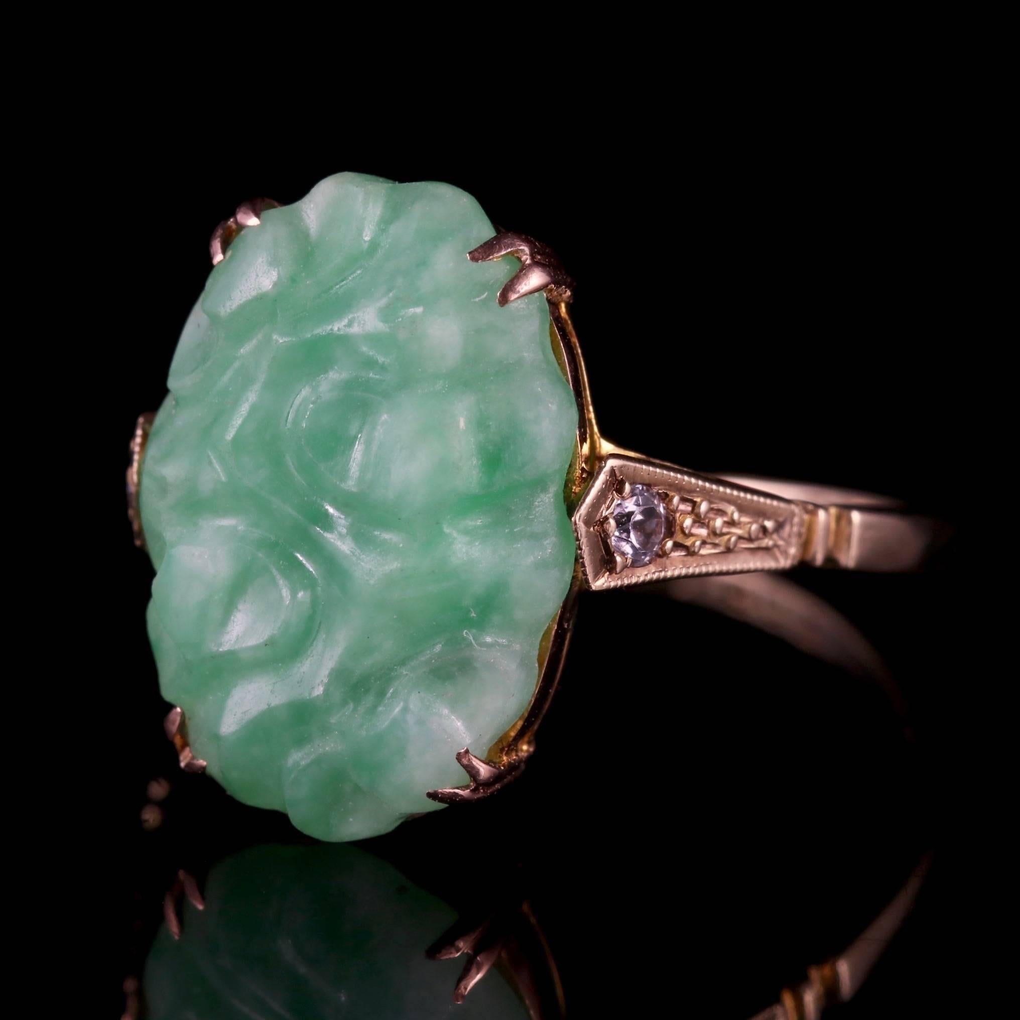 To read more please click continue reading below-

This magnificent 9ct Rose Gold antique Jade ring is Victorian Circa 1900. 

The ring boasts a beautiful engraved Jade stone with two sparkling white Spinel stones at either side. 

Jade is
