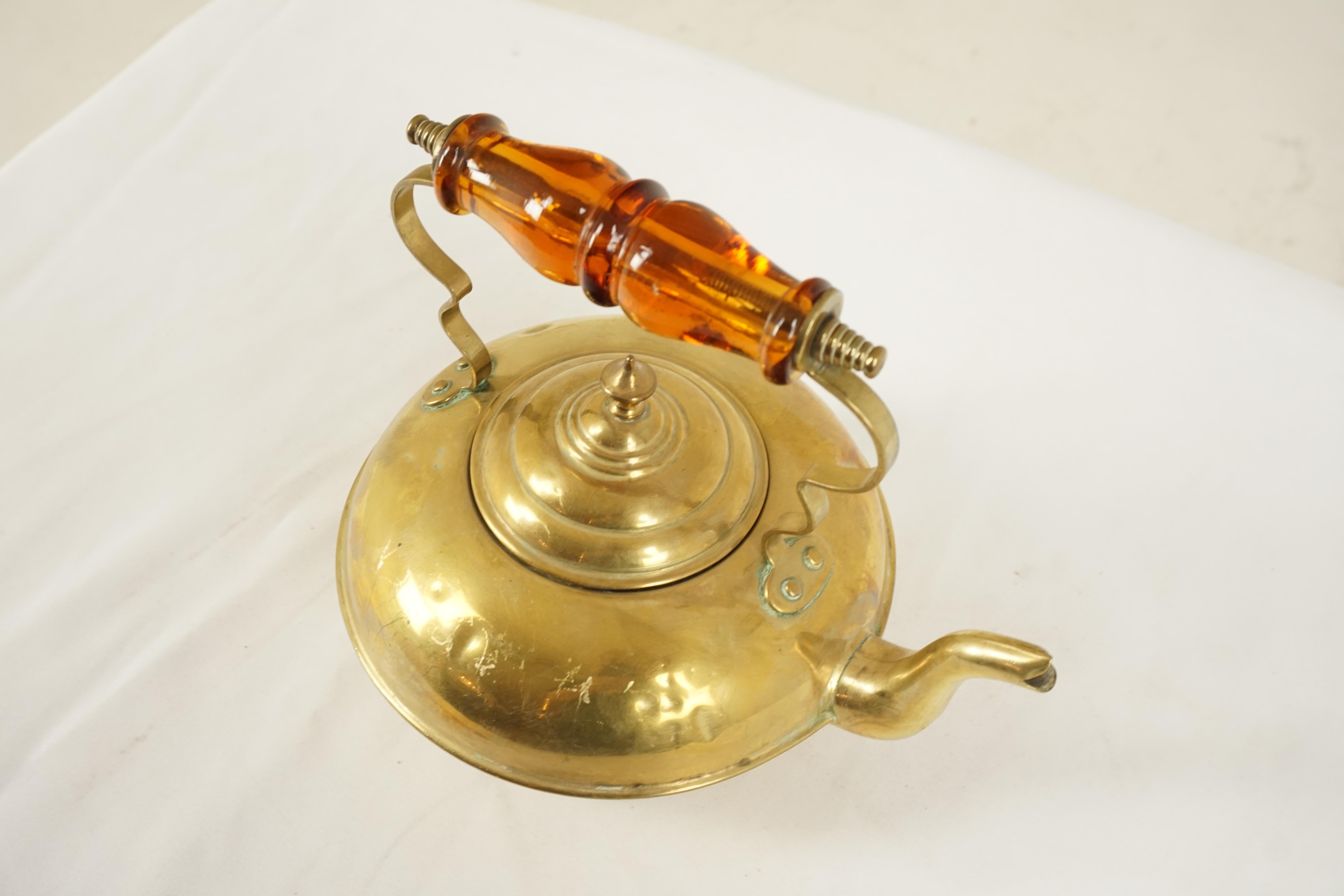 Antique Victorian Kettle, Brass Toddy Kettle, Amber Handle, Scotland 1890, B75y

Scotland 1890
Brass 
Elegant shaped circular body with classic sprout
Amber handle to the top
Tin lining to the inside of the kettle
Kettle stands on three