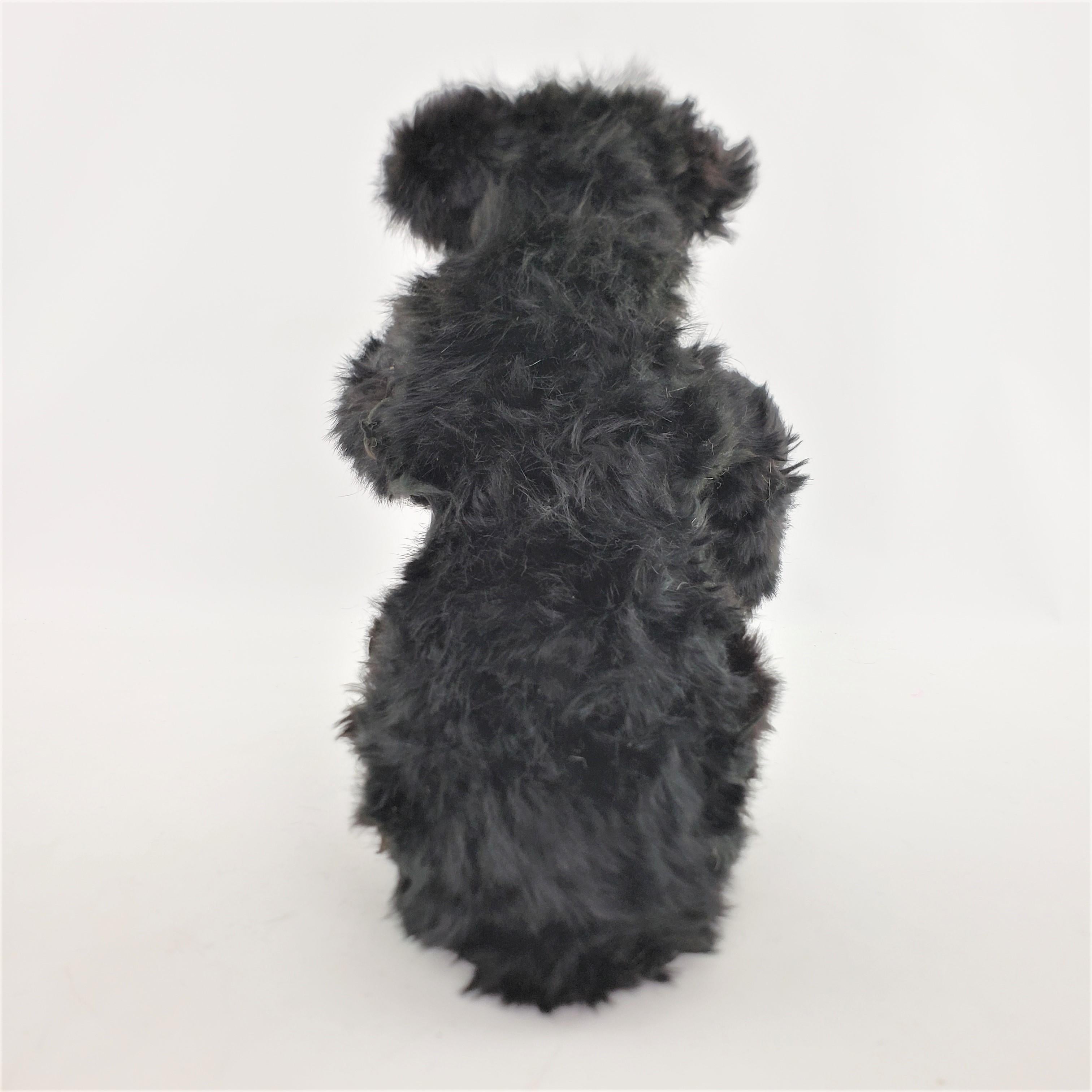 Fait à la machine Grand jouet d'enfant en forme d'ours noir à remontage mécanique à clé victorien ancien, trouvé en vente