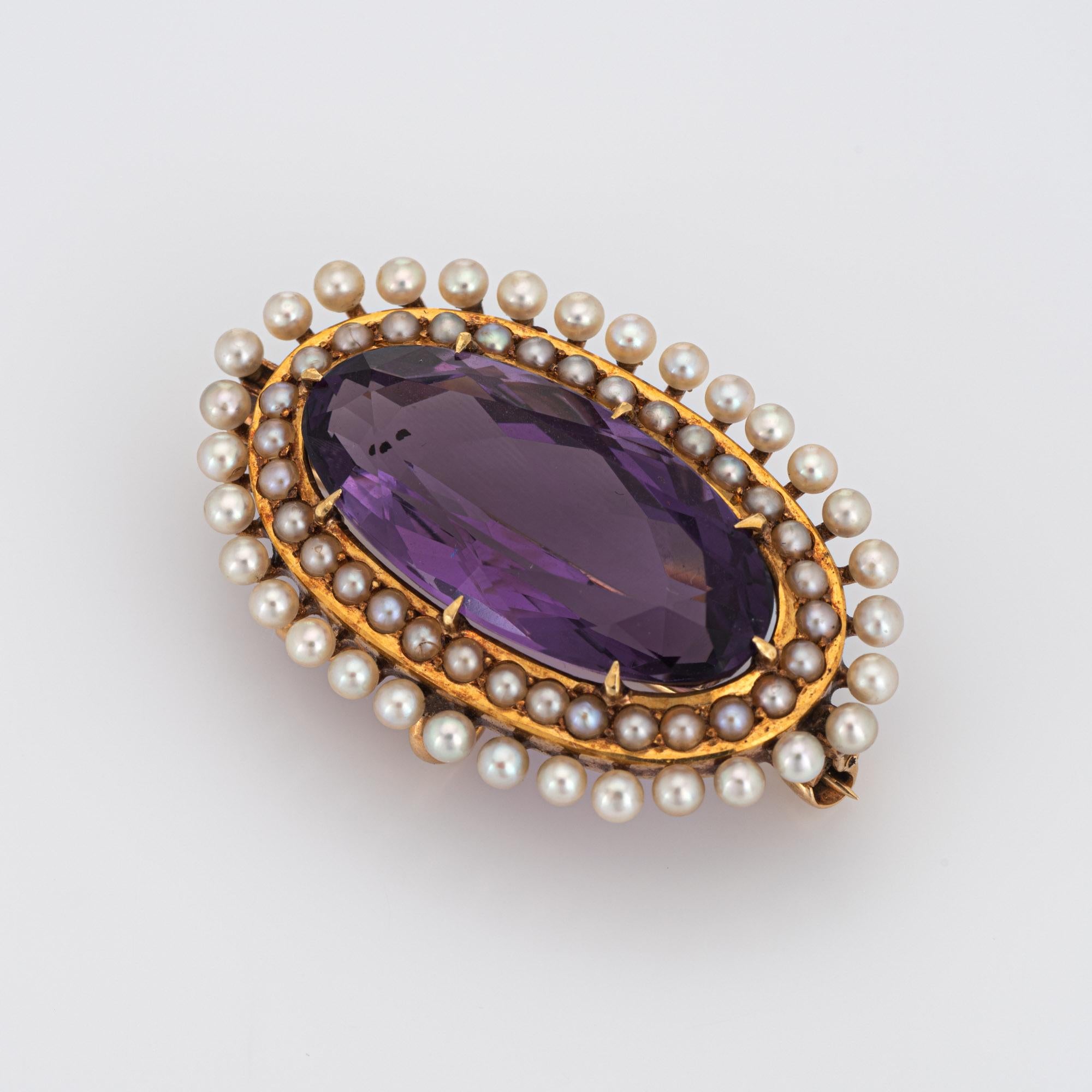 Finely detailed antique Victorian amethyst & seed pearl pendant/brooch (circa 1880s to 1900s), crafted in 14 karat yellow gold by Krementz.

Oval faceted amethyst measures 21mm x 11mm (estimated at 9 carats). 64 seed pearls graduated in size from