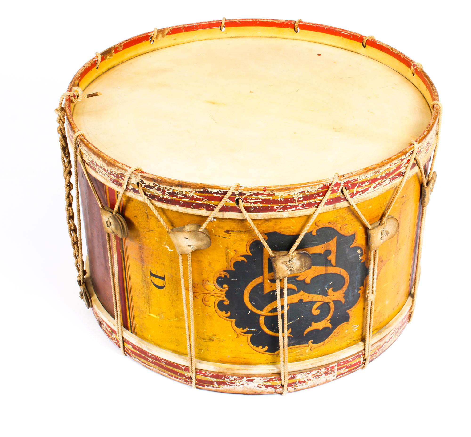 This is a truly magnificent and highly attractive large Victorian military band drum by the world-famous manufacturer of instruments, Hawkes & Son, London, circa 1892 in date. 

This remarkable drum is made of sturdy wood, well-built rope and
